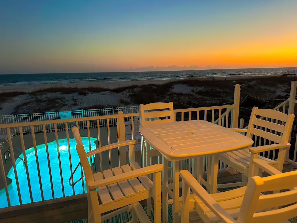Twilight on your private deck with ocean and pool views!