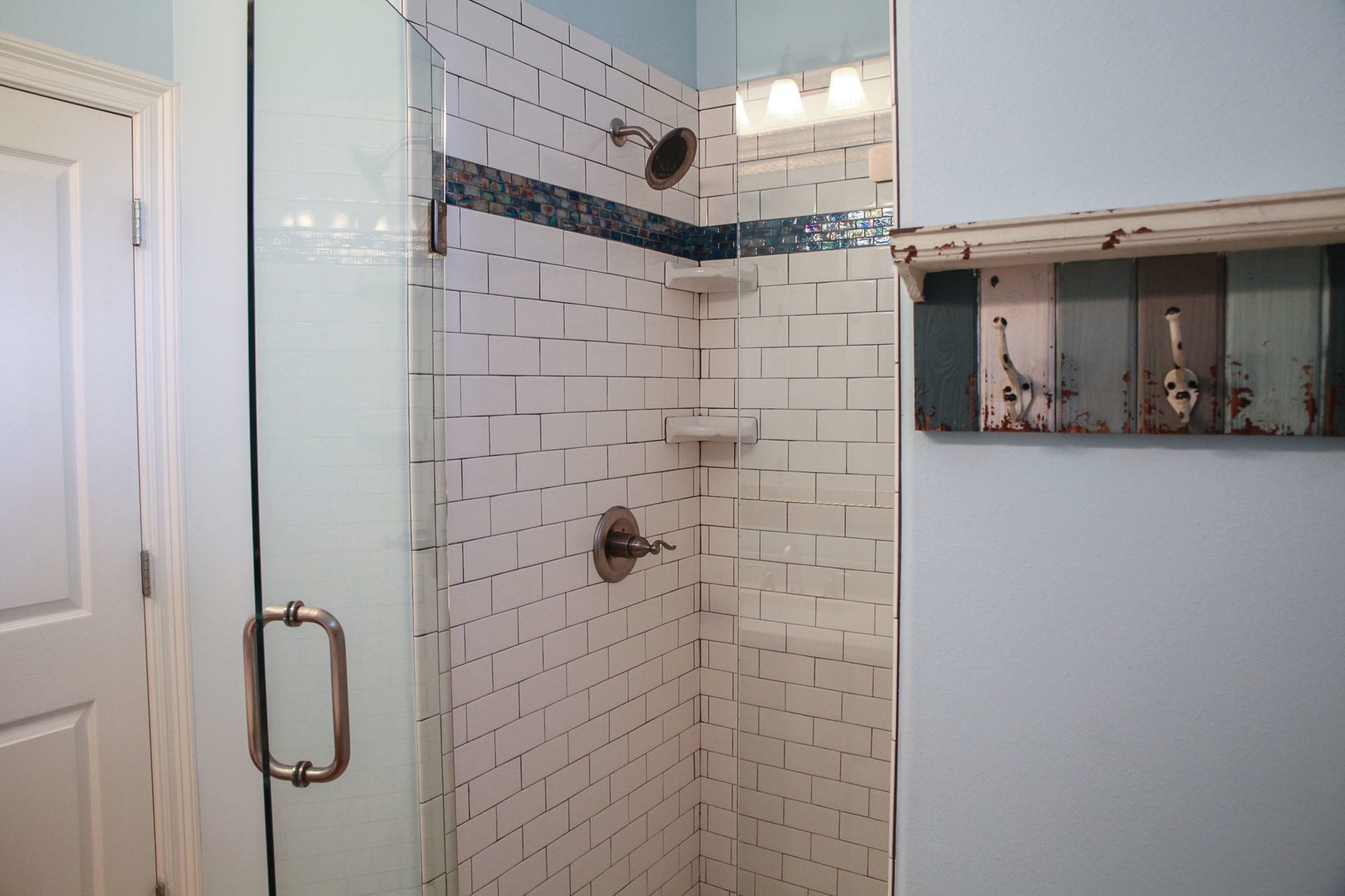 Newly tiled subway shower on main level