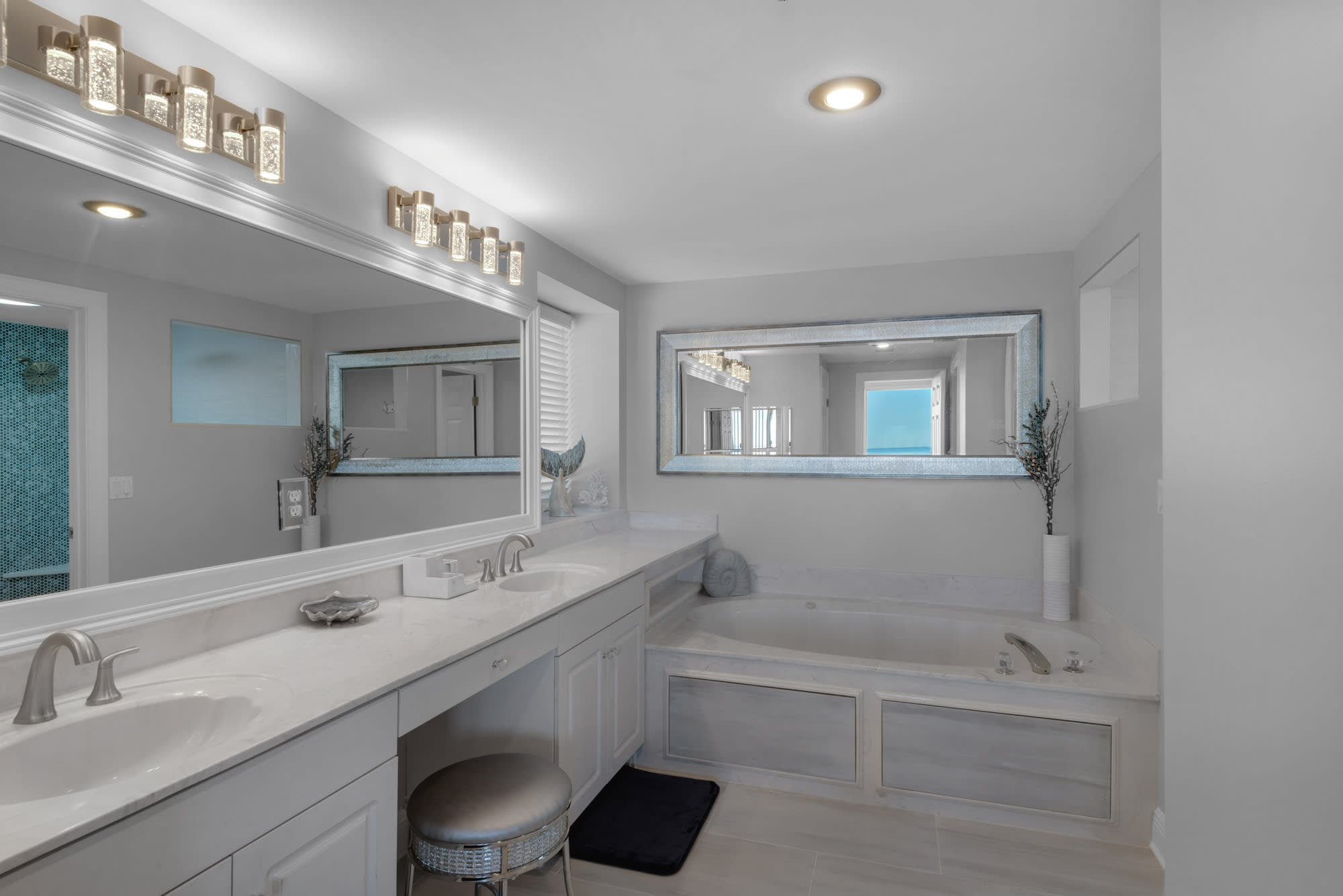 Luxury bathroom with makeup area