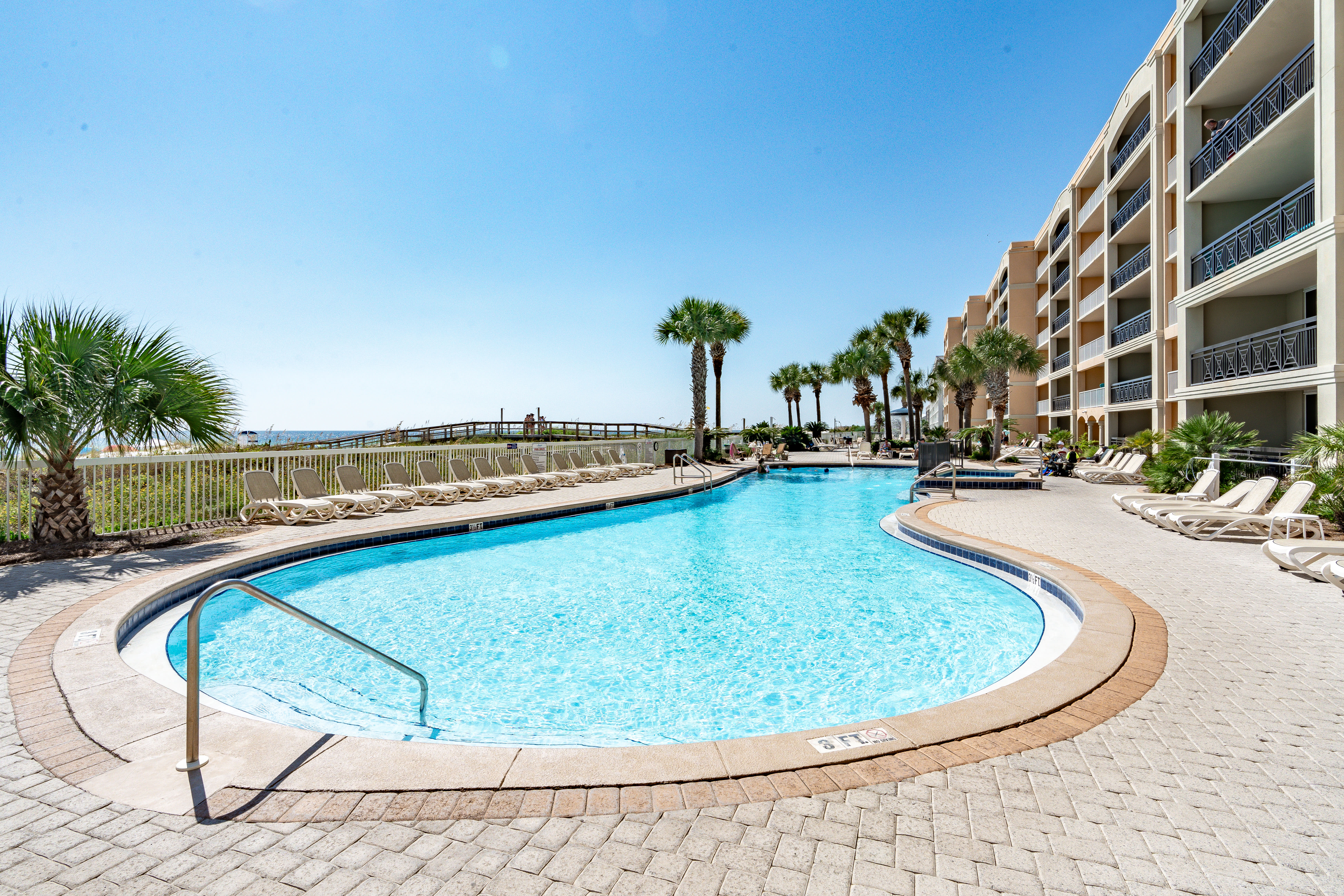 Resort-style beachfront pool with Gulf views.