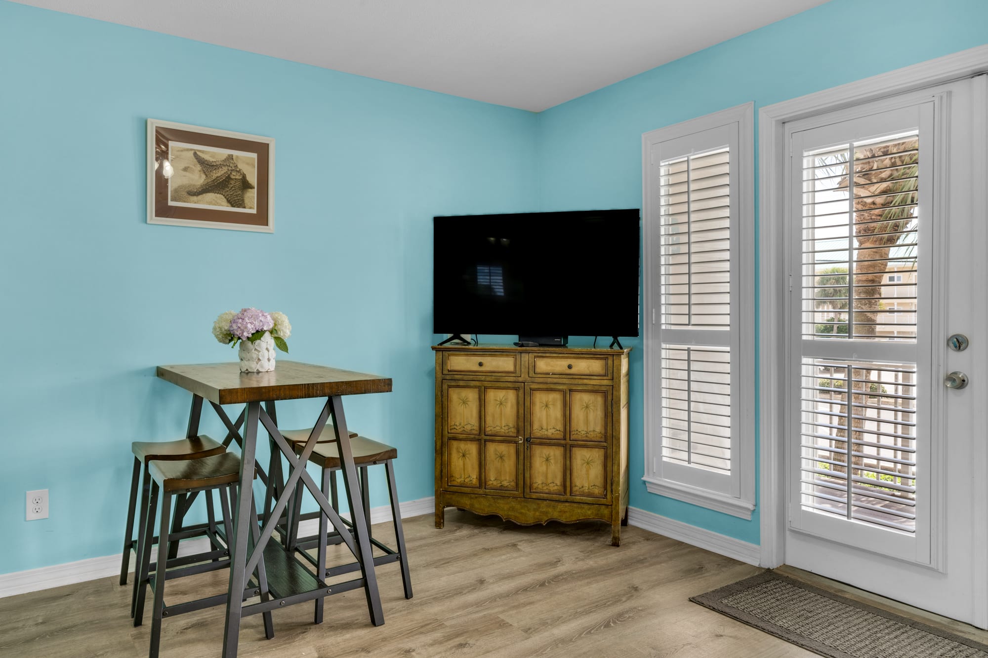 TV with cable and games and videos in cabinet