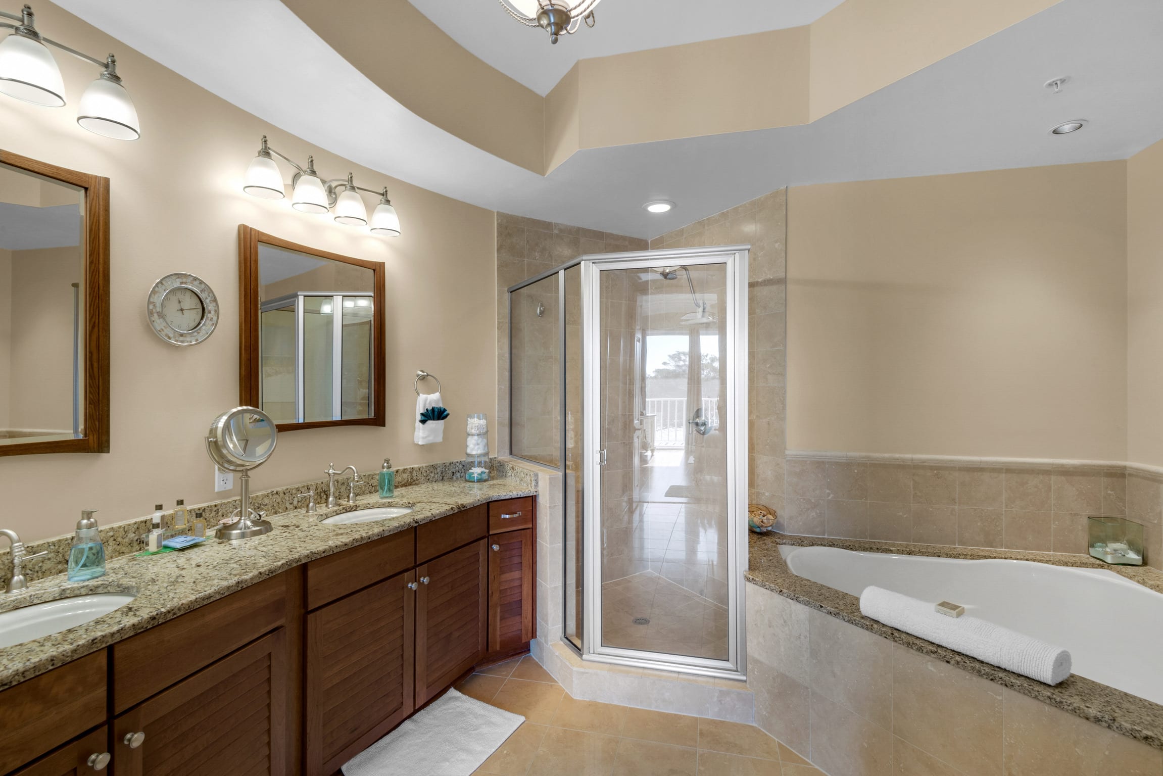 Master bath with double sinks, shower and garden tub to relax in