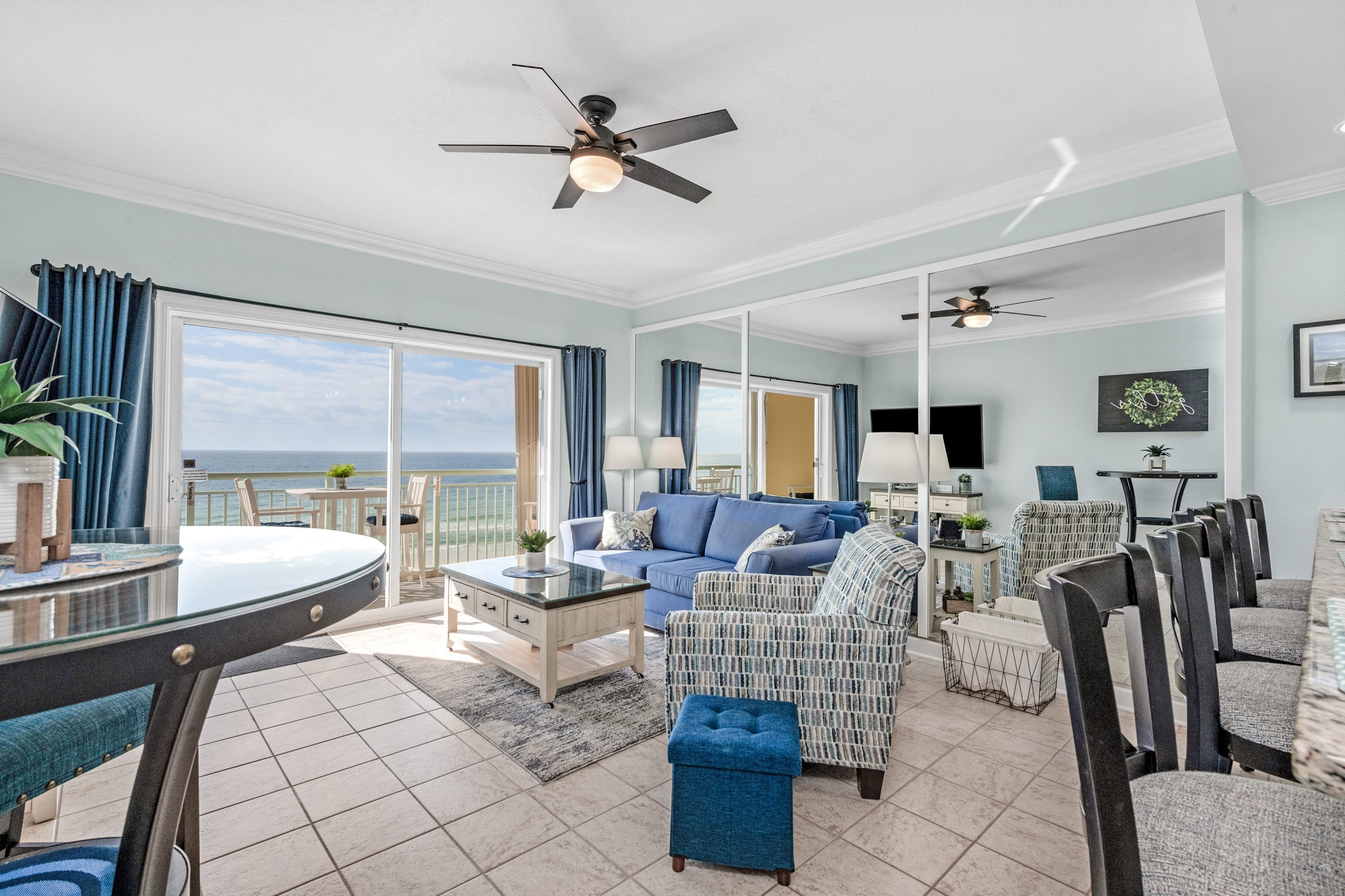 Large family room with panoramic views of the sugar white sand beaches and Emerald Ocean