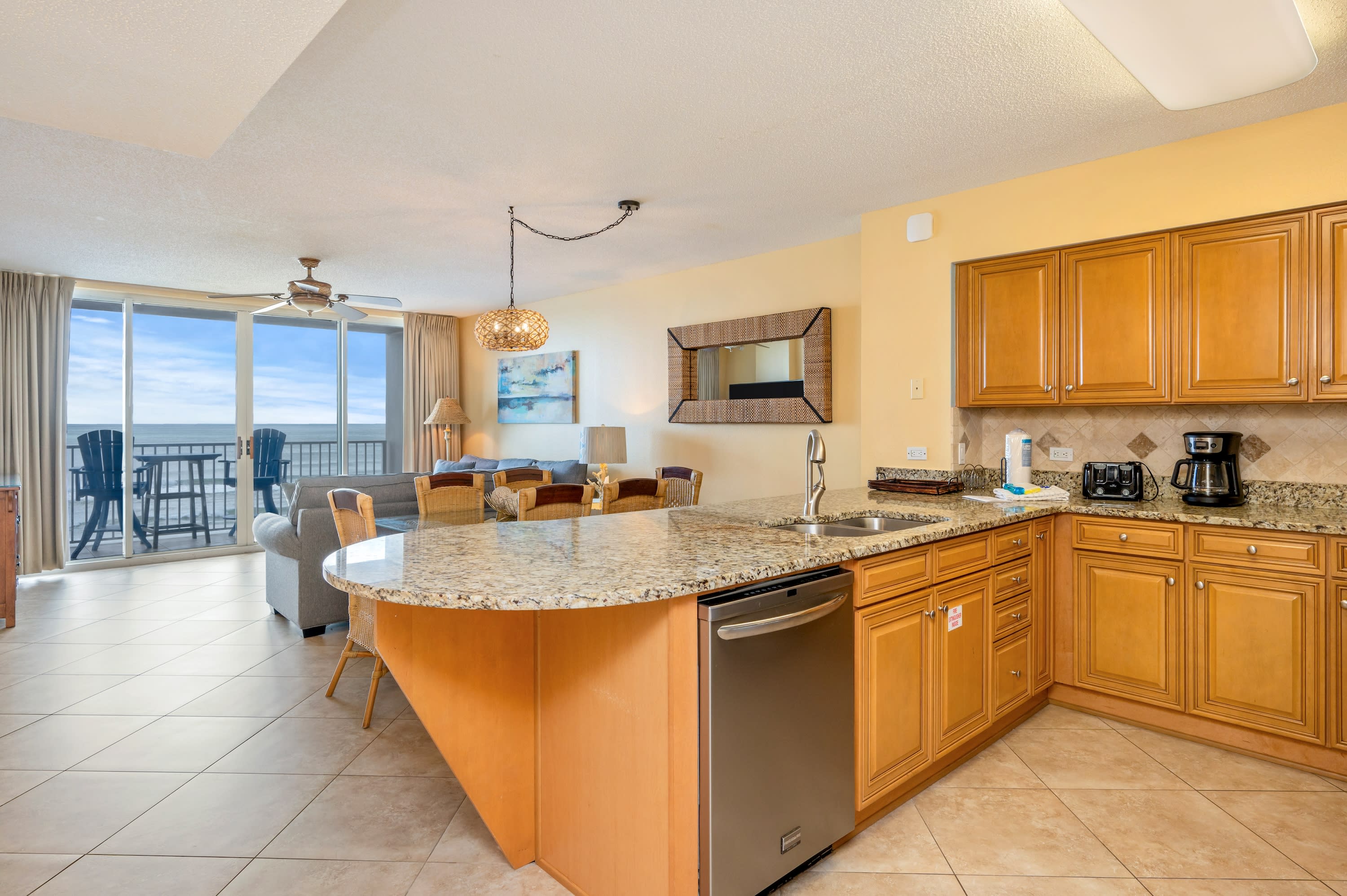 Notice the open flow between the kitchen, dining and living areas