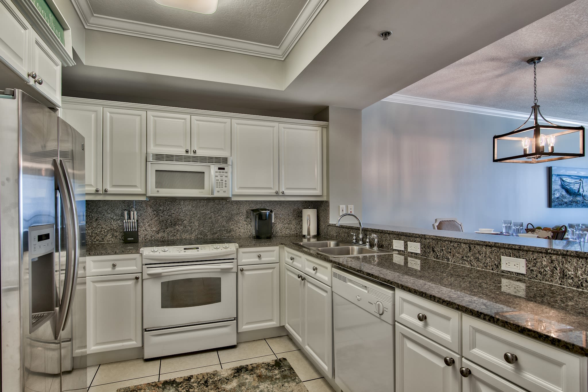 Our kitchen is well stocked for cooking and has a beautiful view of the Gulf!