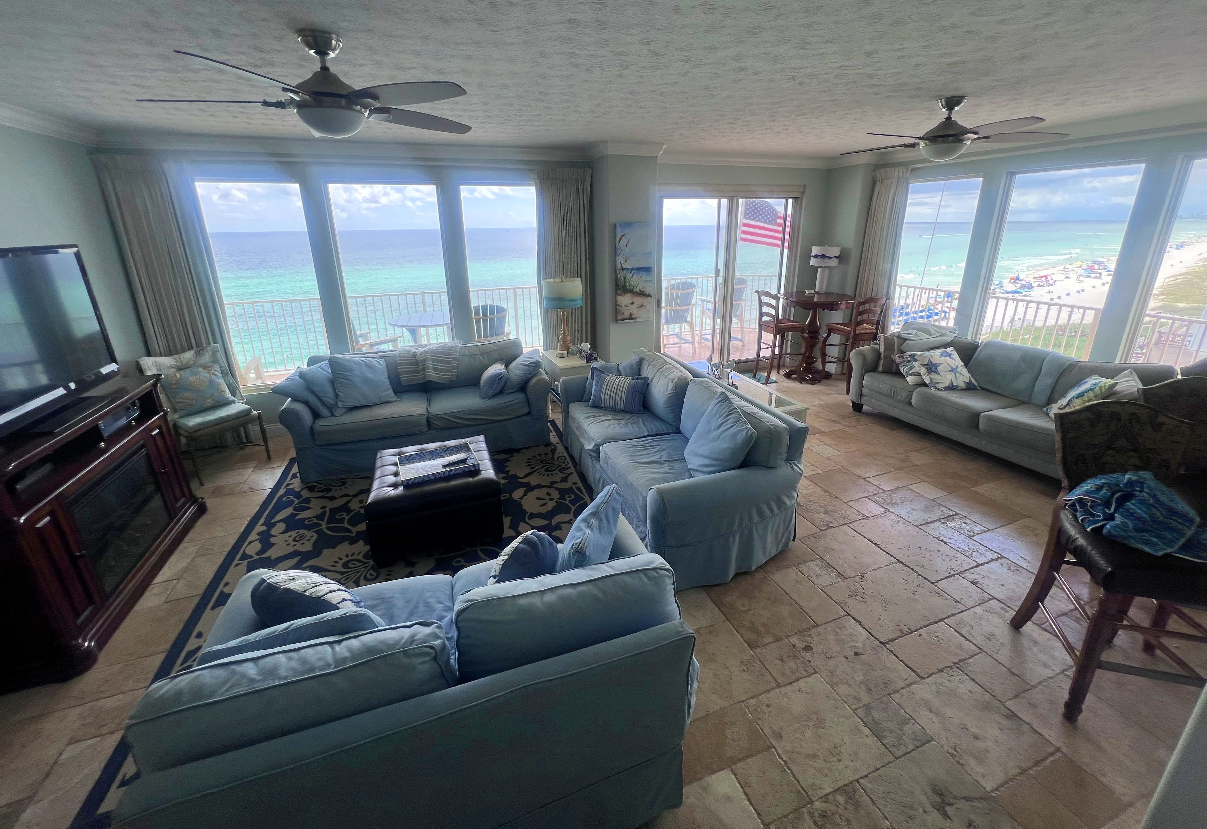 Living room with access to our wrap around balcony &amp; view of Gulf &amp; beach