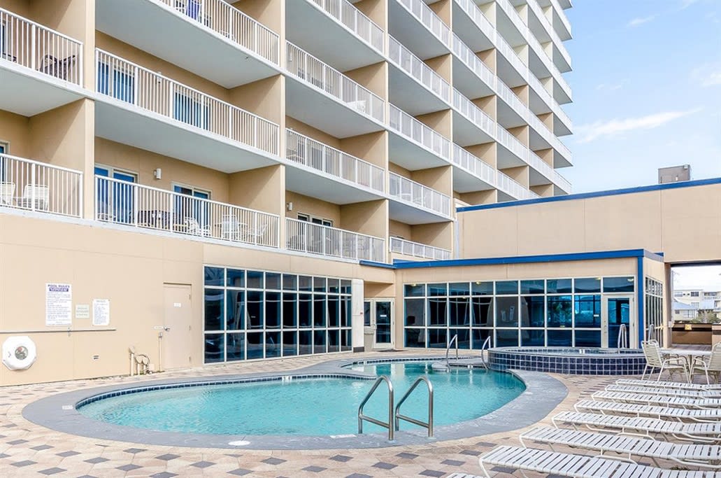 Relax by the outdoor pool on 1st floor of the building