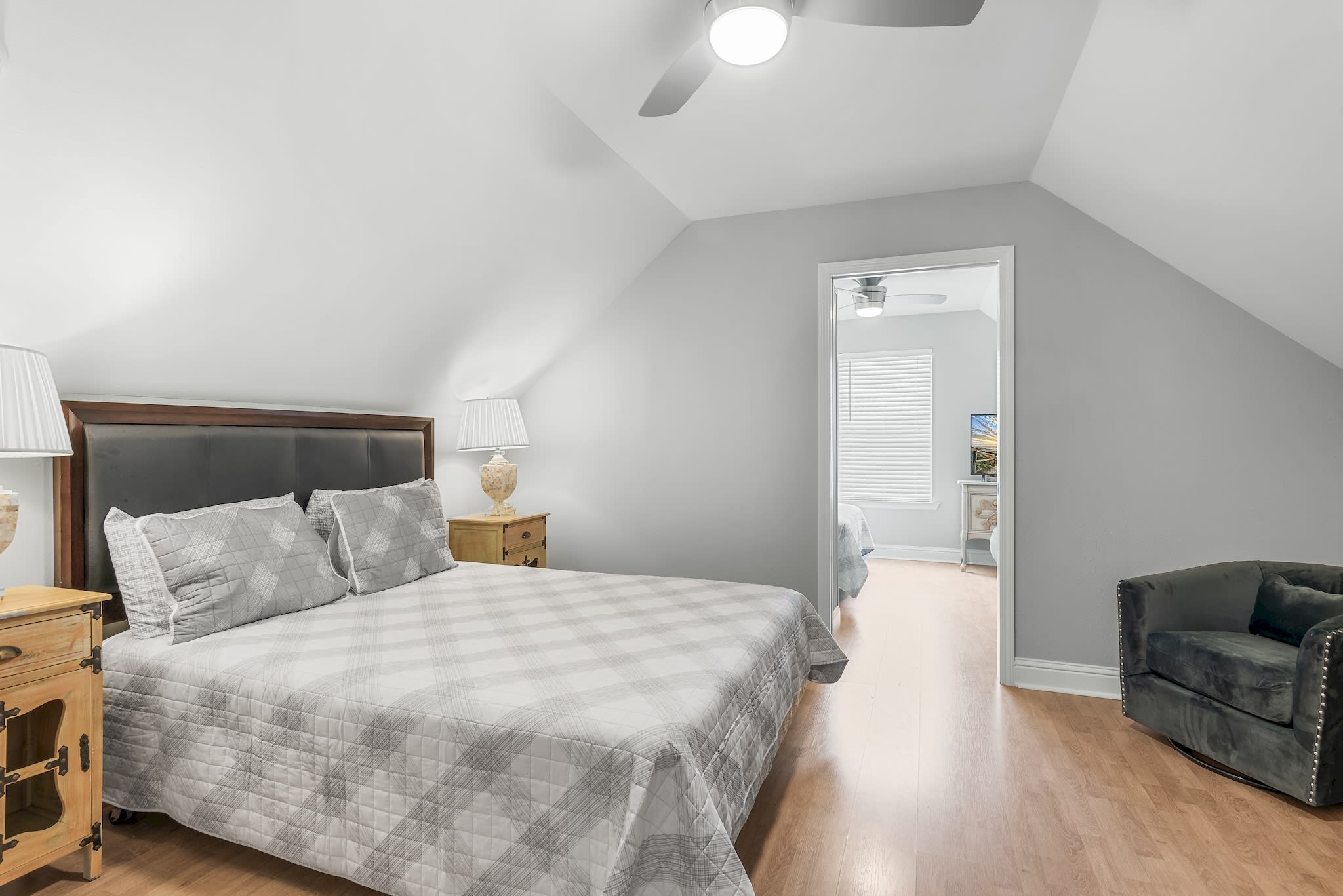 Queen Bedroom 1 Upstairs with two dresser and two chairs