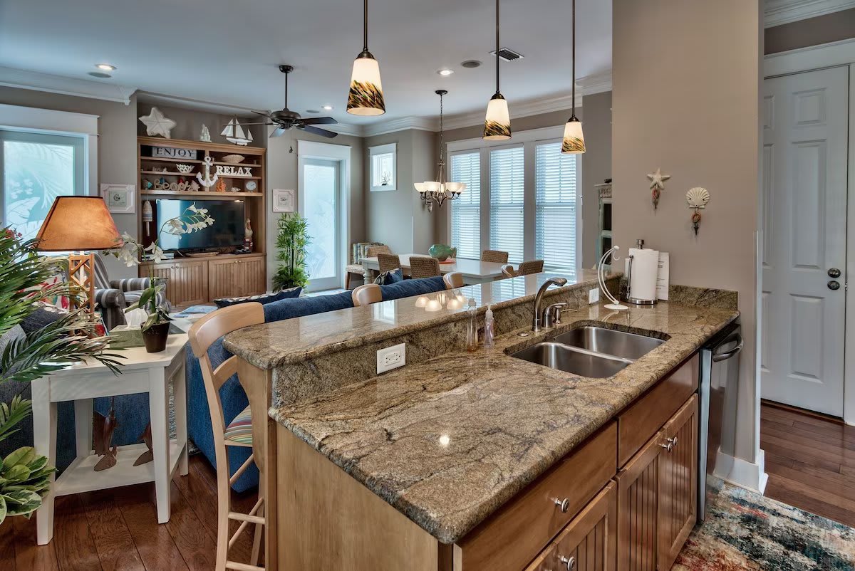 View from kitchen to dining. Very inviting for an after the beach beverage.