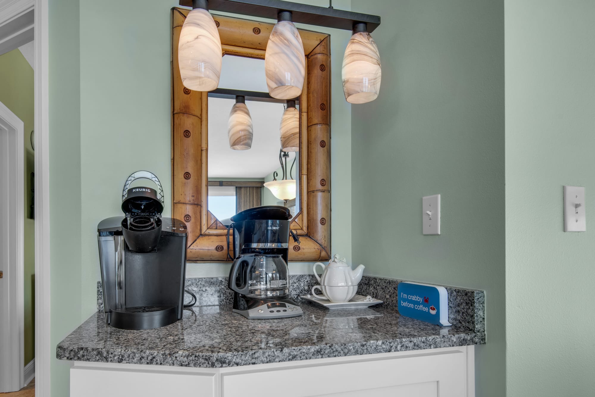 Coffee bar with Mr. Coffee and Keurg coffee maker.