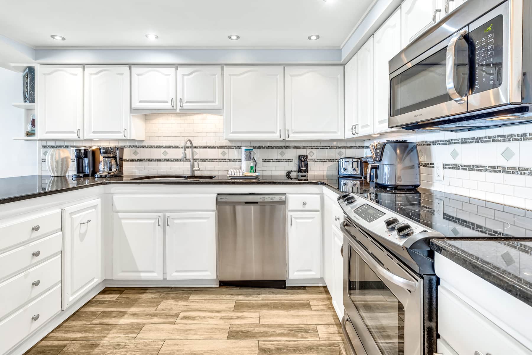 All standard appliances and cookware provided