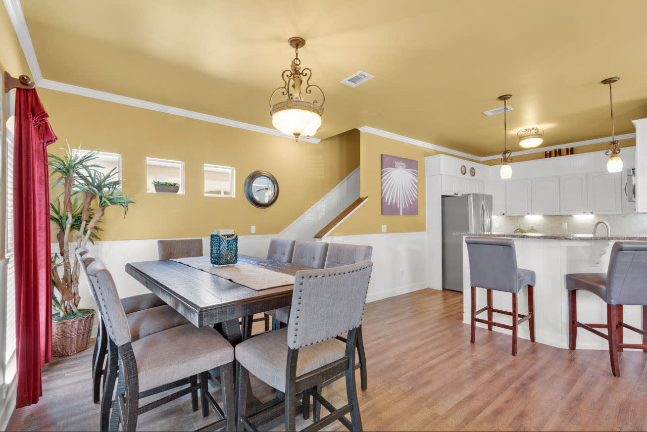 Dining area with seating for 8 and counter seating for 4.