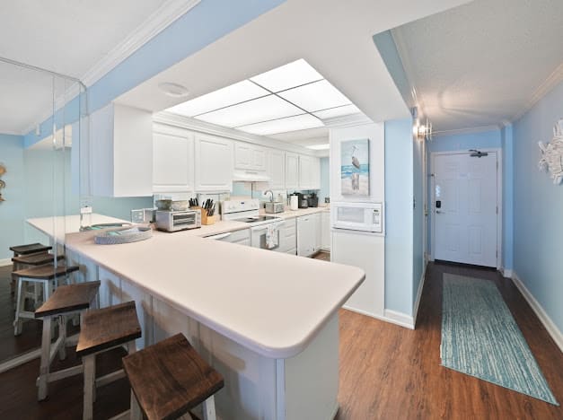 Enter into the kitchen area, perfect to drop off the groceries as you arrive. 