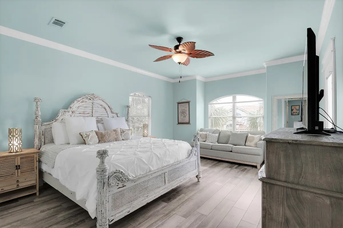 Seafoam-24 IInd floor king master suite with private full bath, private balcony, and sitting area with sleeper sofa.