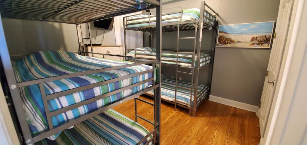 3rd Bedroom awesome bunk room each bunk having reading lights and power strips.