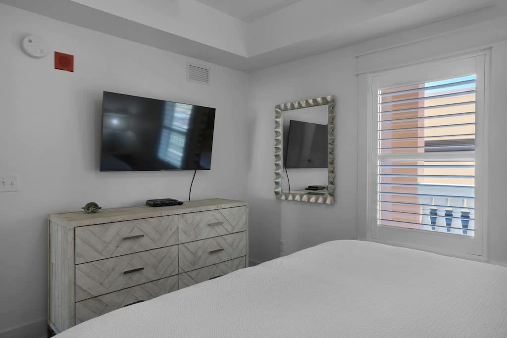 Smart 65-inch TV in Master Bedroom