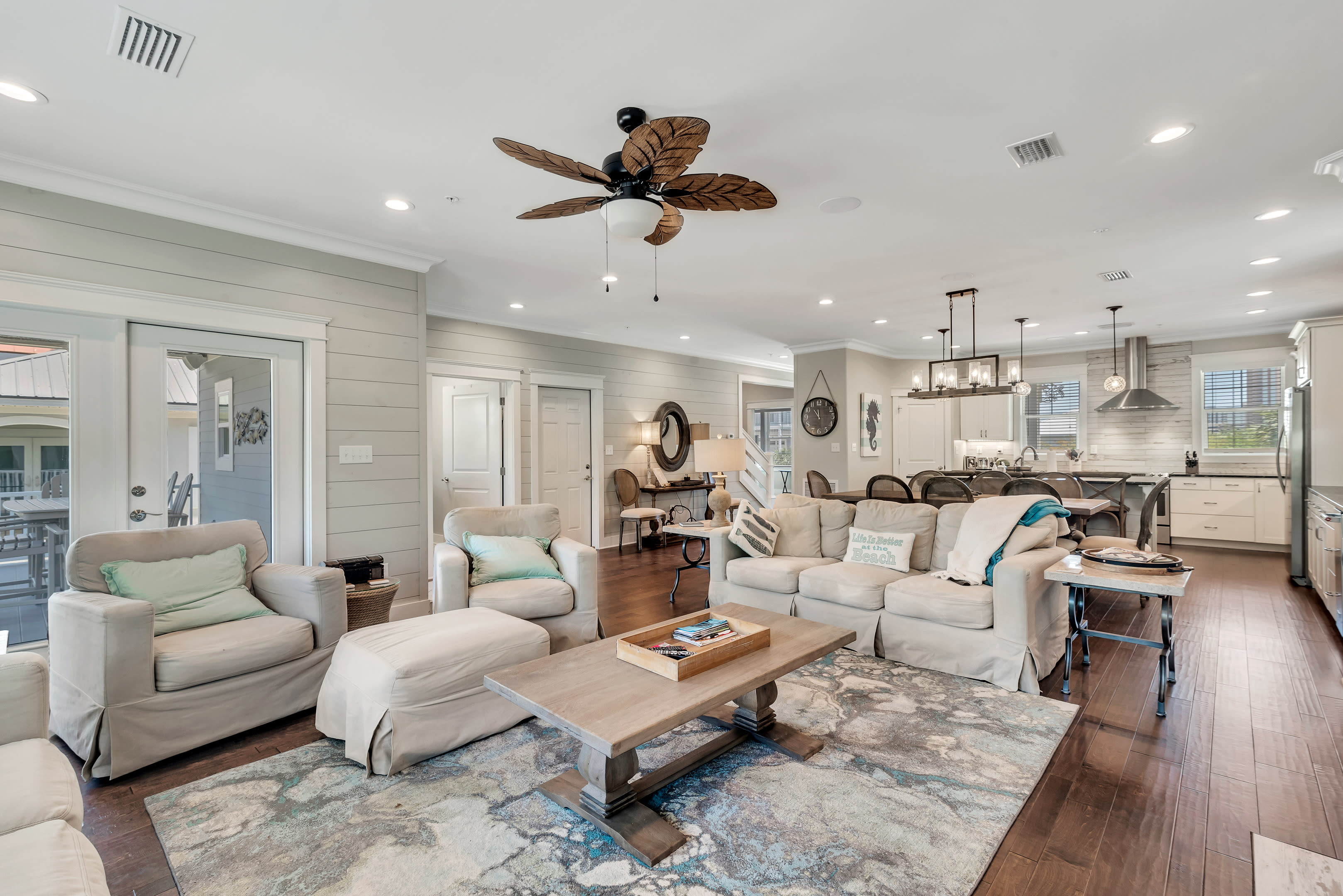 Living room with comfortable couches and roomy chairs.