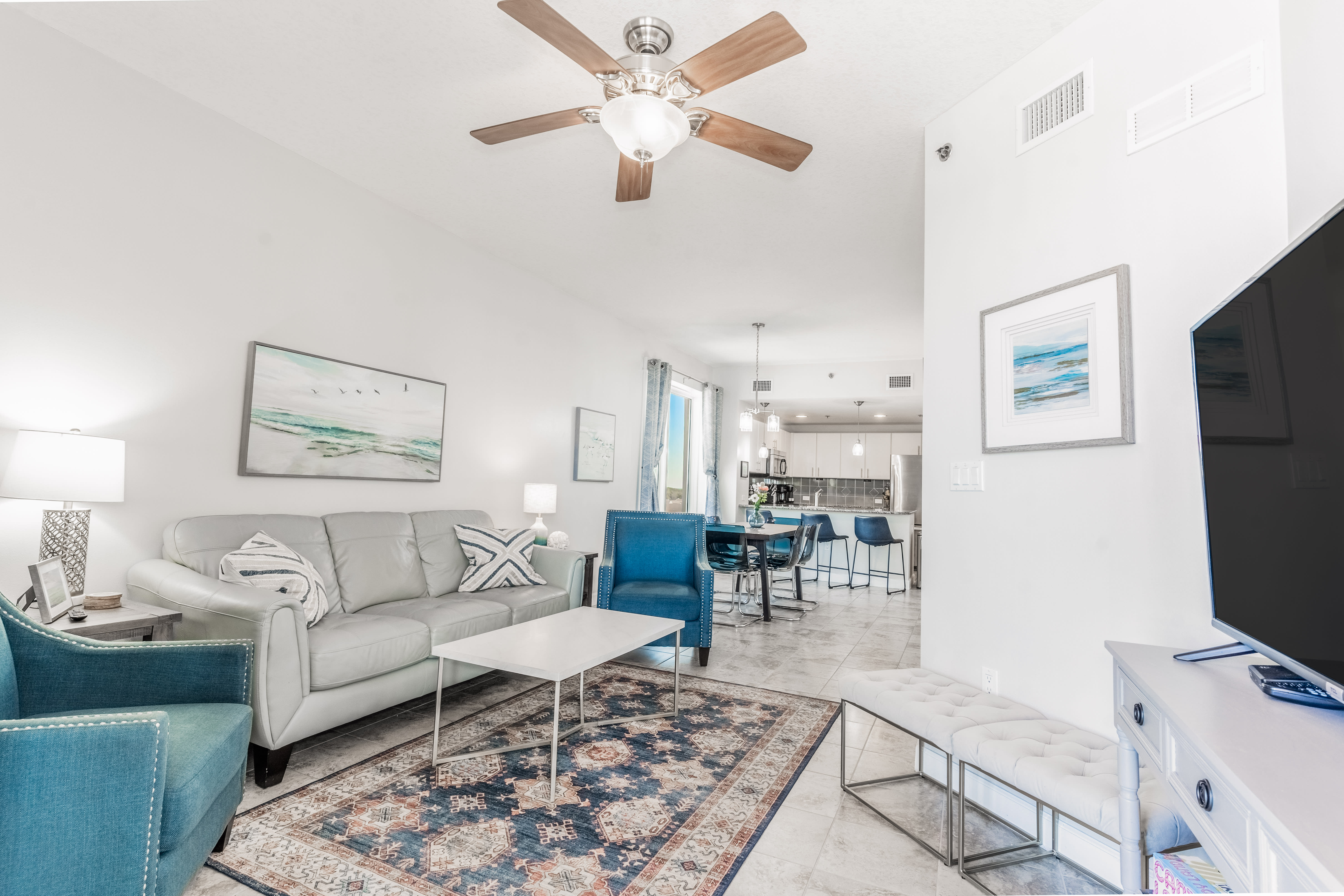 Living room with balcony entrance, smart tv