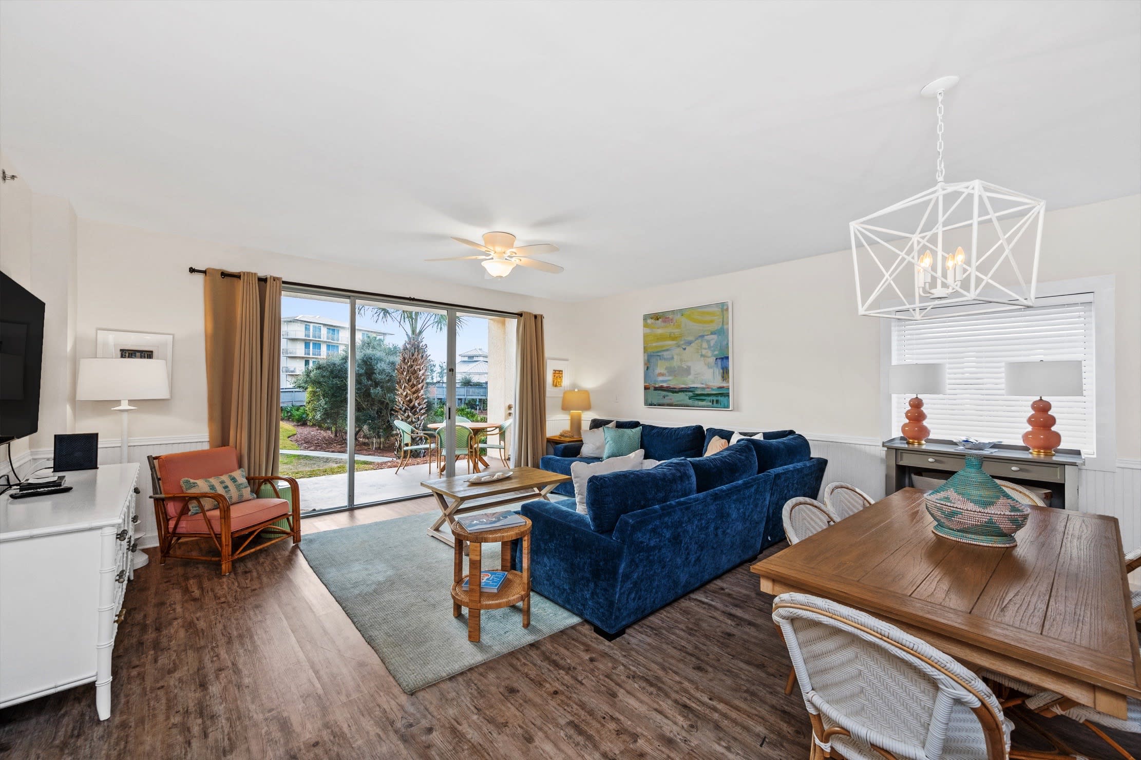 Beautiful living room with floor to ceiling windows, step right out to the pool.