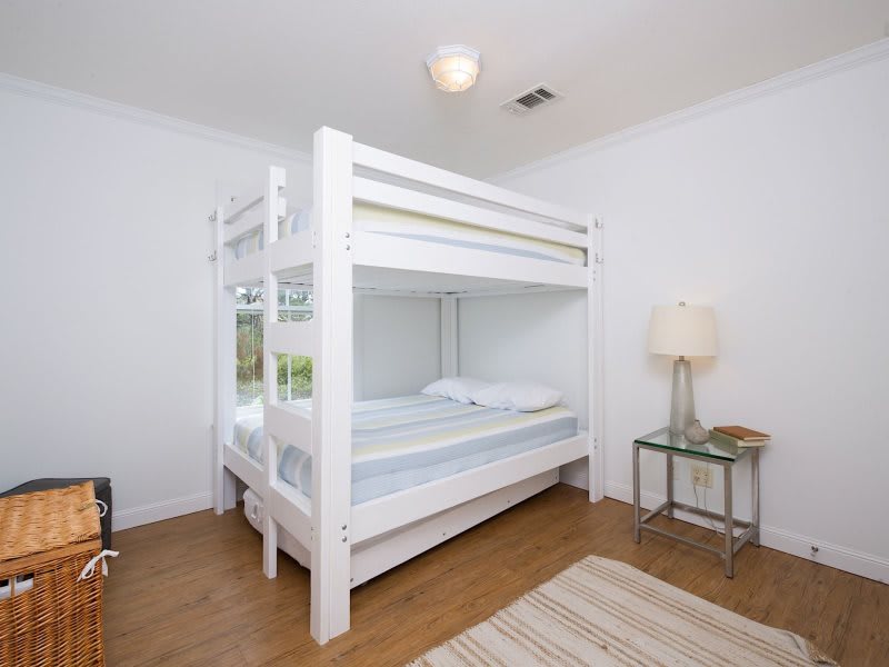 Full over Full bunk bed with twin trundle in the guest bedroom
