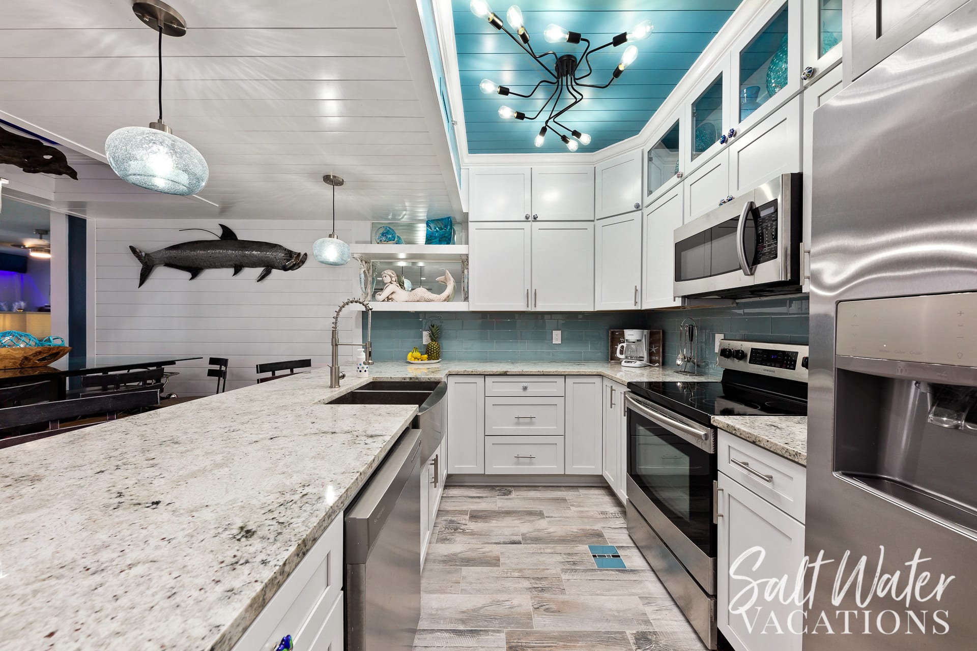 Beautiful coastal kitchen highlighted with stainless steel appliances 