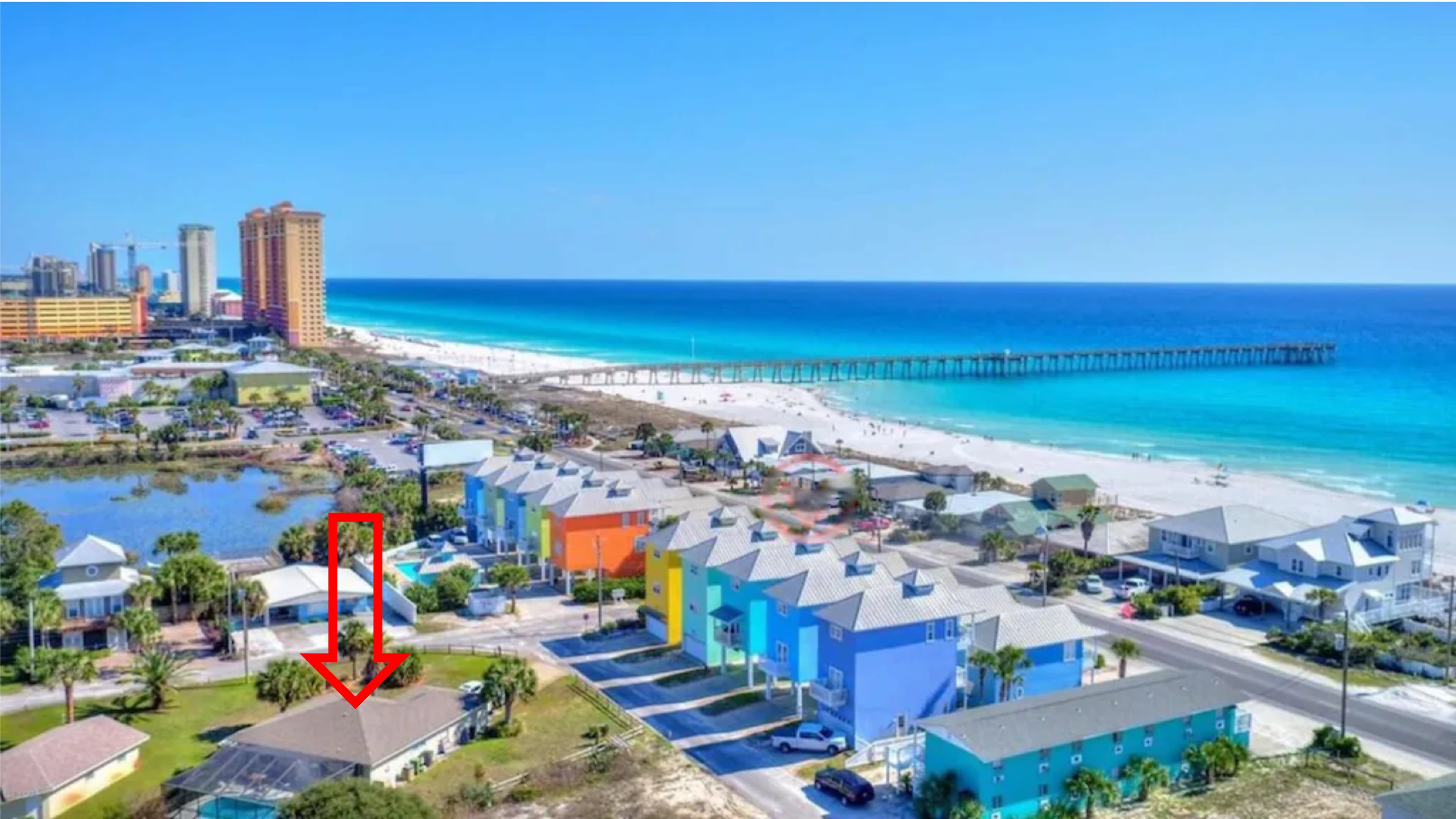 Beach entrance just across the street and Pier Park on other side of lake in pix