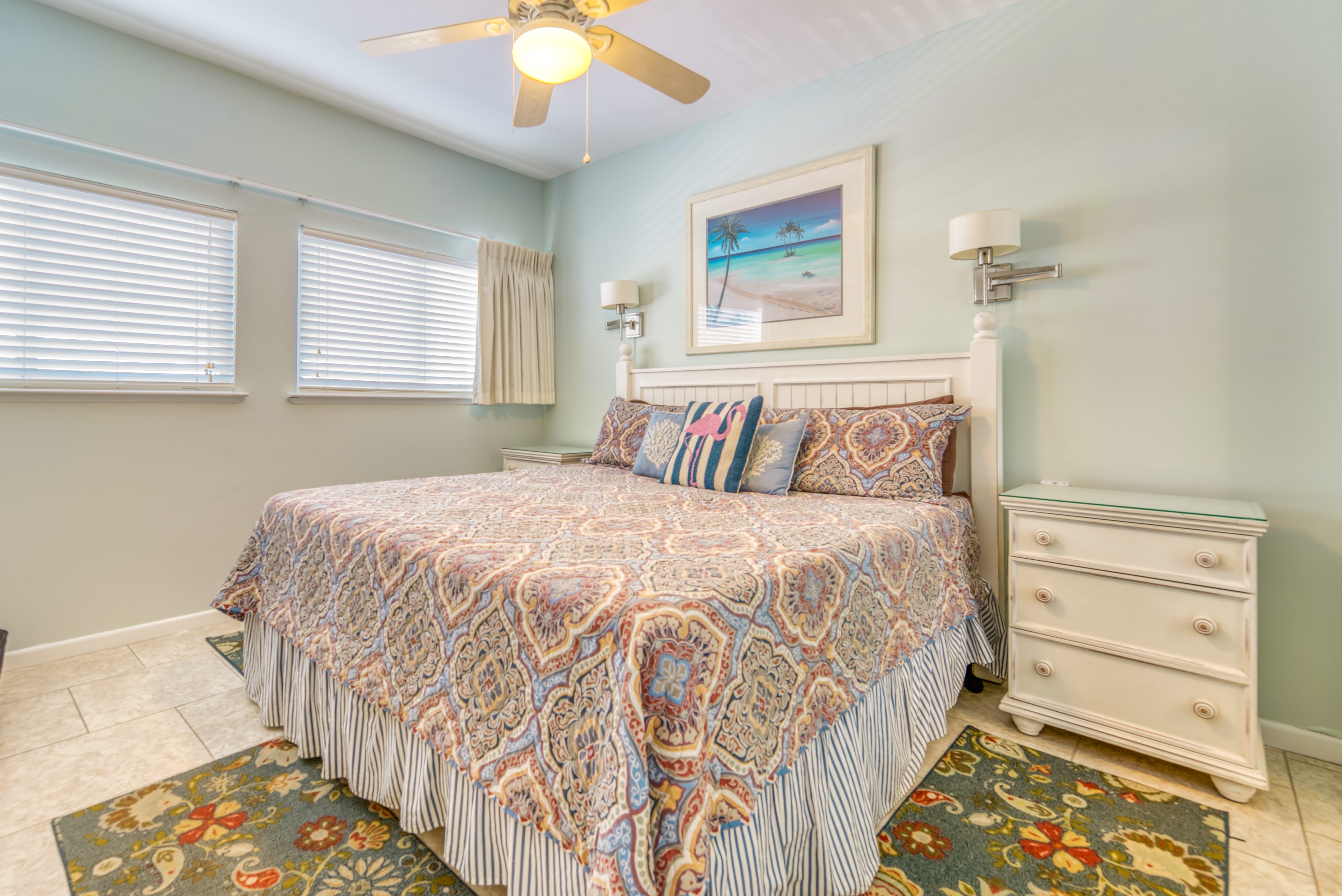 Sleep soundly in a comfy king bed with a serene beach vibe.