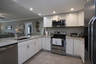 The spacious, fully stocked kitchen is a great place to cook all your meals! 