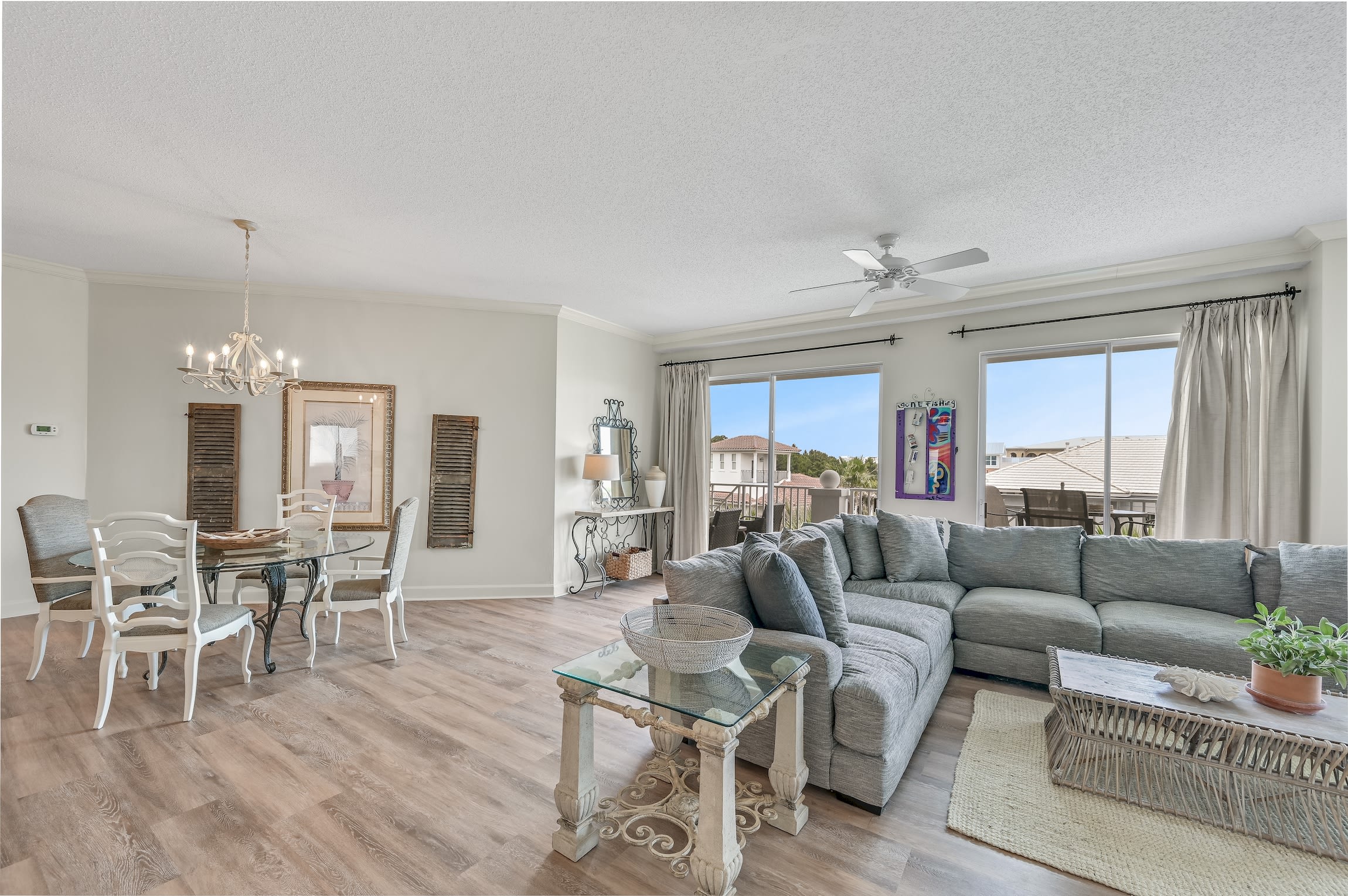 Large living area, dining, and kitchen. New dining table not shown in photo