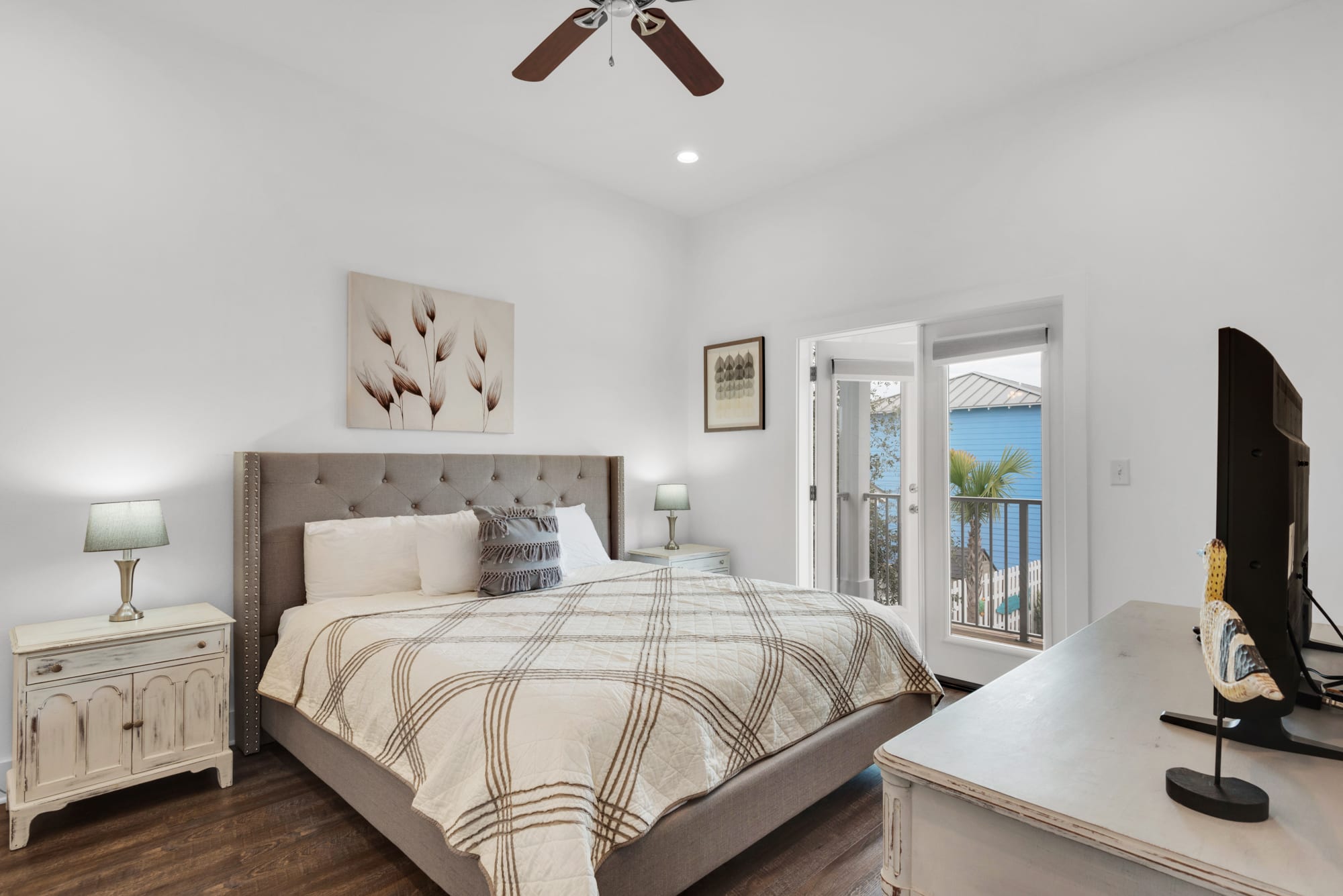 King Bedroom with private bathroom and access to deck overlooking the pool