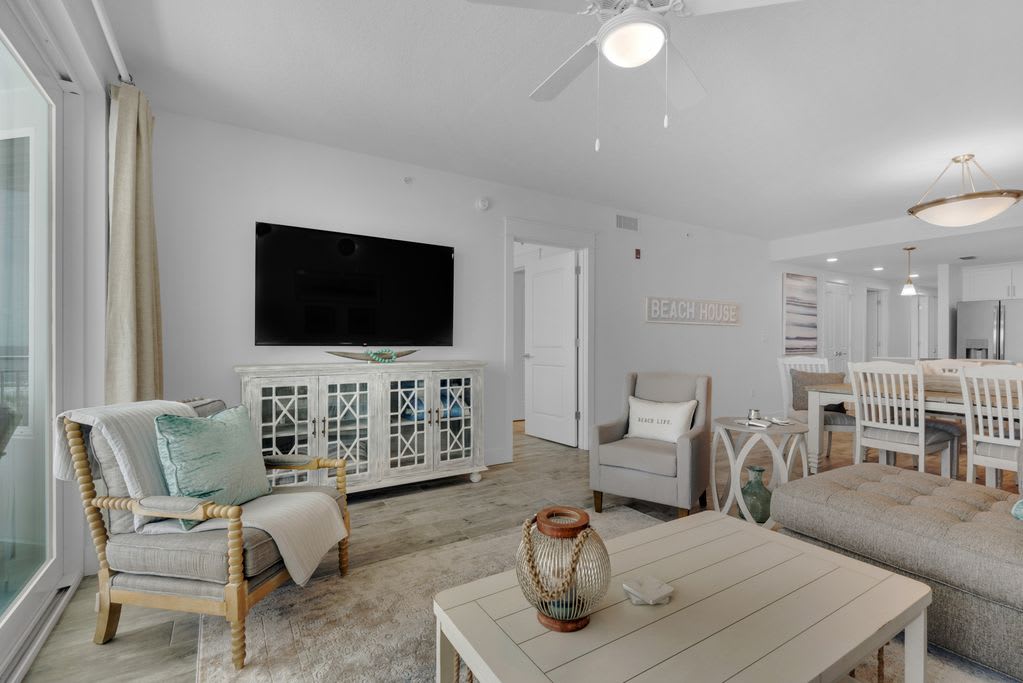 Living room area includes a 65'' smart TV