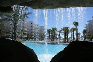 Waterfall in middle pool, that is 1 of 3 pools and 2 spas! Grills are in courtyd.