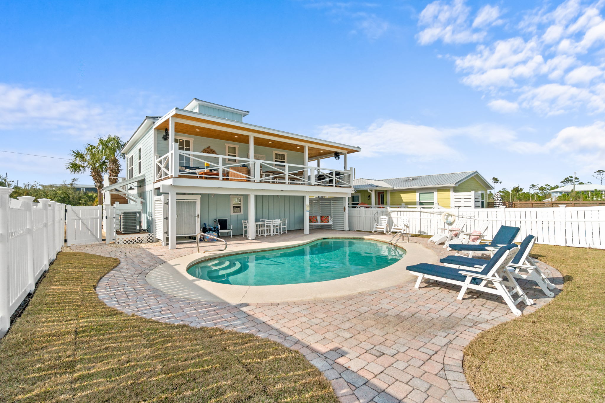 Back Exterior Covered Patio/Deck and Pool Area
