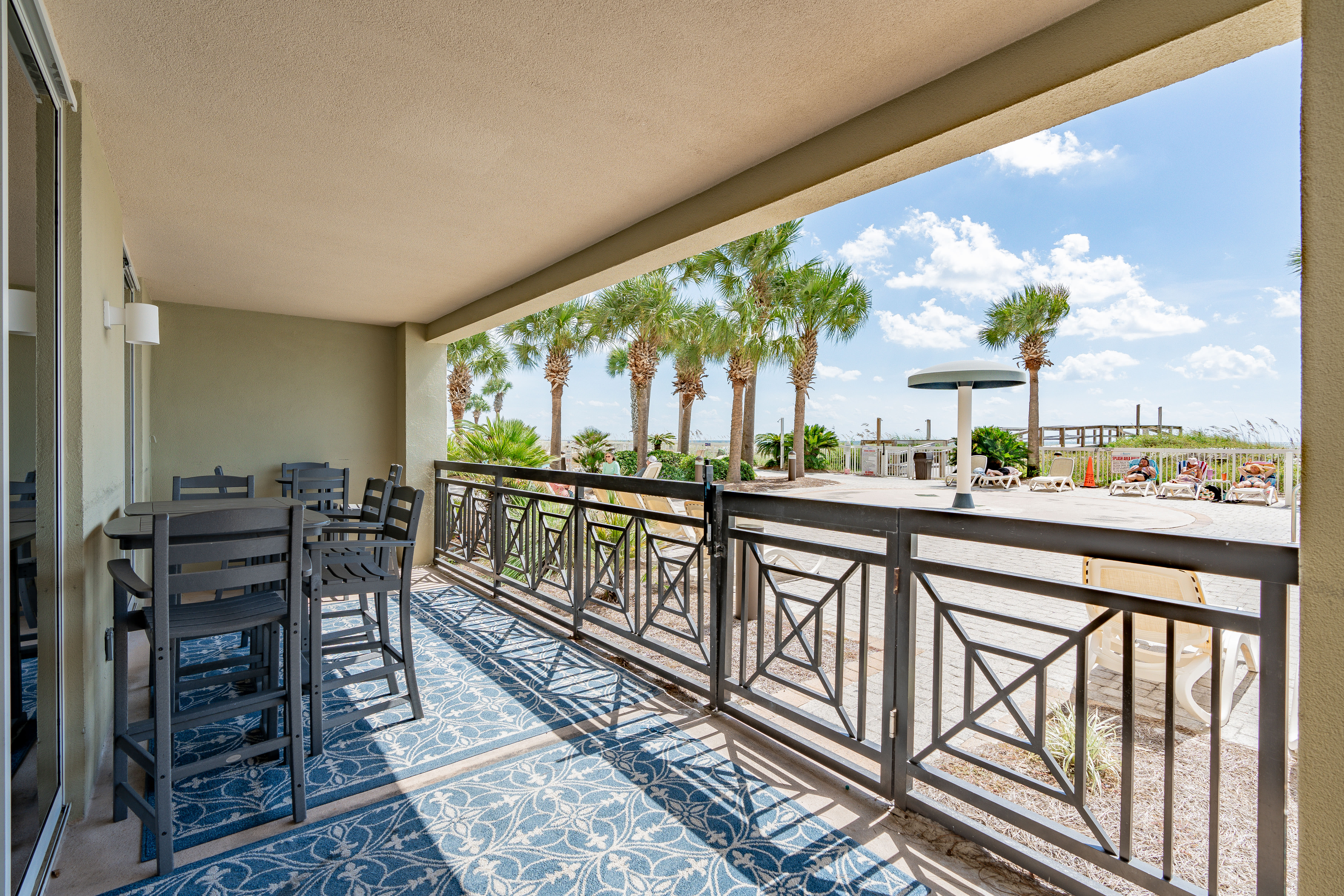 Ground-floor Gulf views with direct beach walkout.