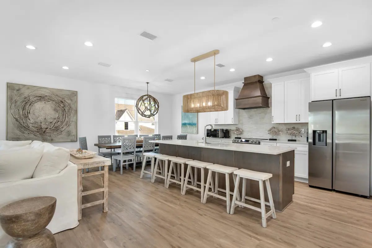 Driftwood-6 Plenty of space and dining options for your big group at Driftwood. The stylish dining area accommodates 12, with additional seating for 6 at the kitchen island (not to mention outdoor dining area on the 4th floor covered balcony).