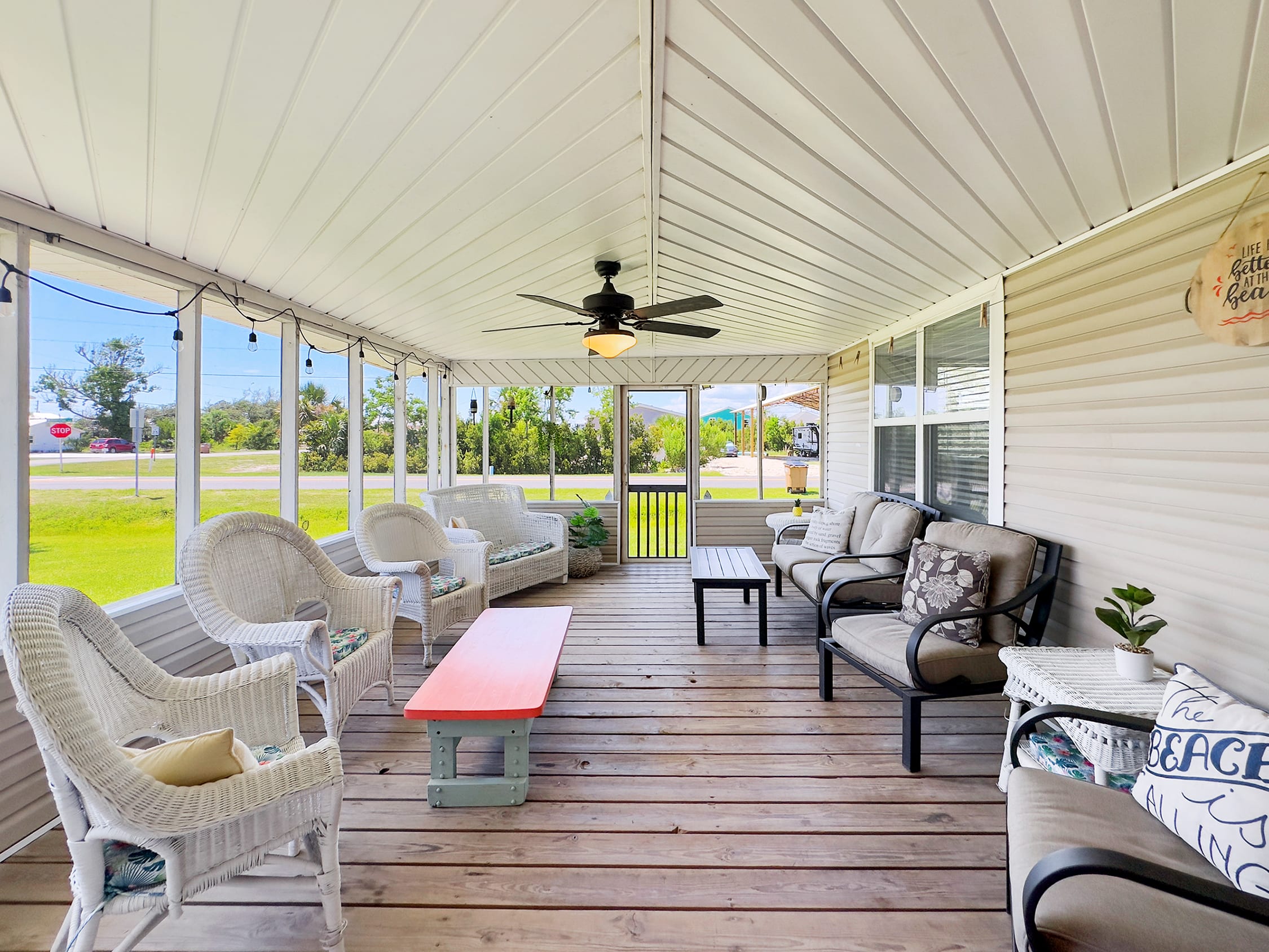 Screened porch with seating for everyone