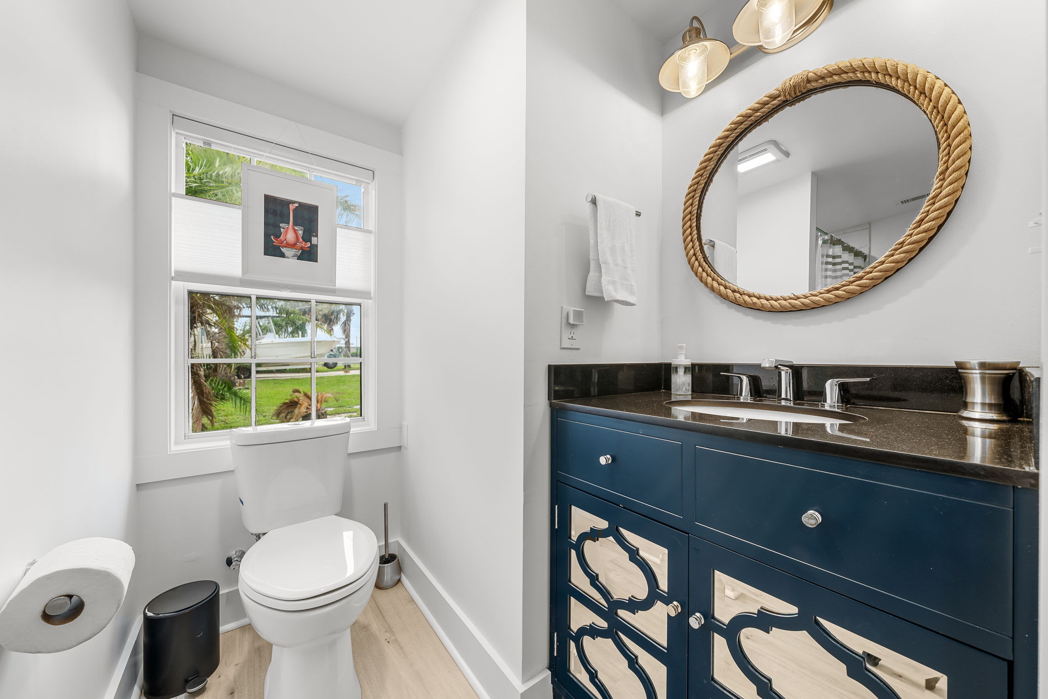 Located in the hall off the kitchen and next to a king room.