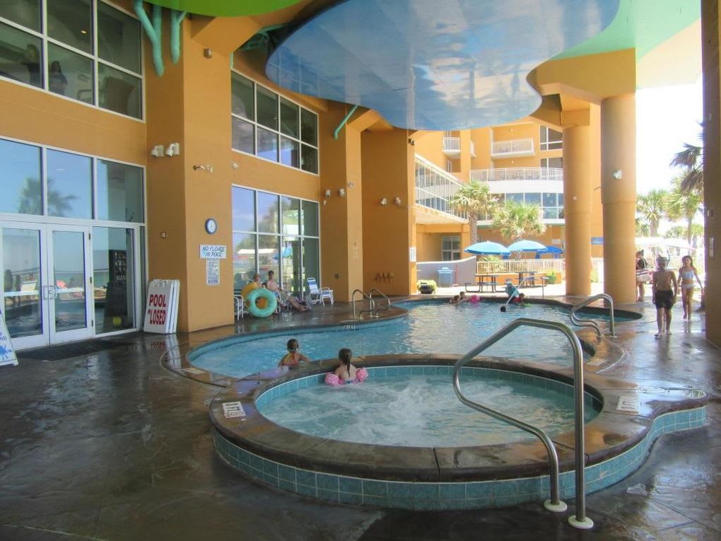 Hot-Tub next to covered heated pool.