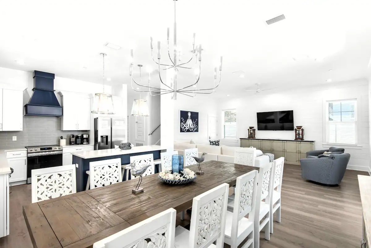 Vista-11 Lots of room and dining configurations for your large group. Vista's stylish dining area seats 12. Kitchen island seating for 4. First floor al fresco dining seating for 4.