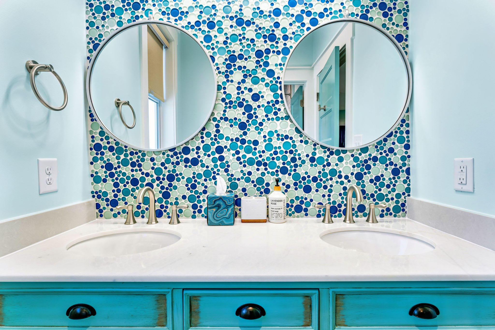 Kids bathroom with tub and shower, dual vanities
