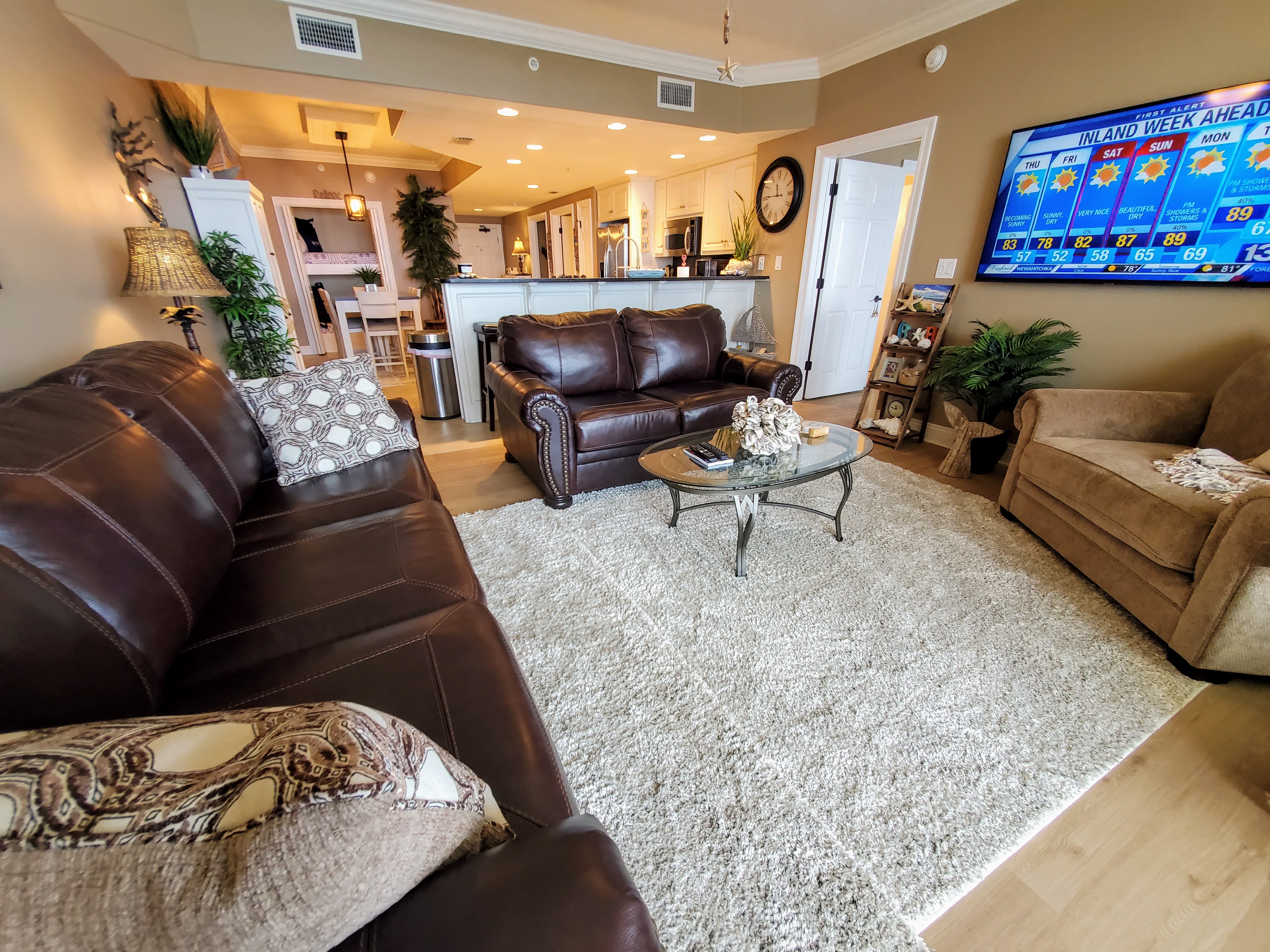 Living Room has 65 inch Smart TV and a beautiful view of gulf!