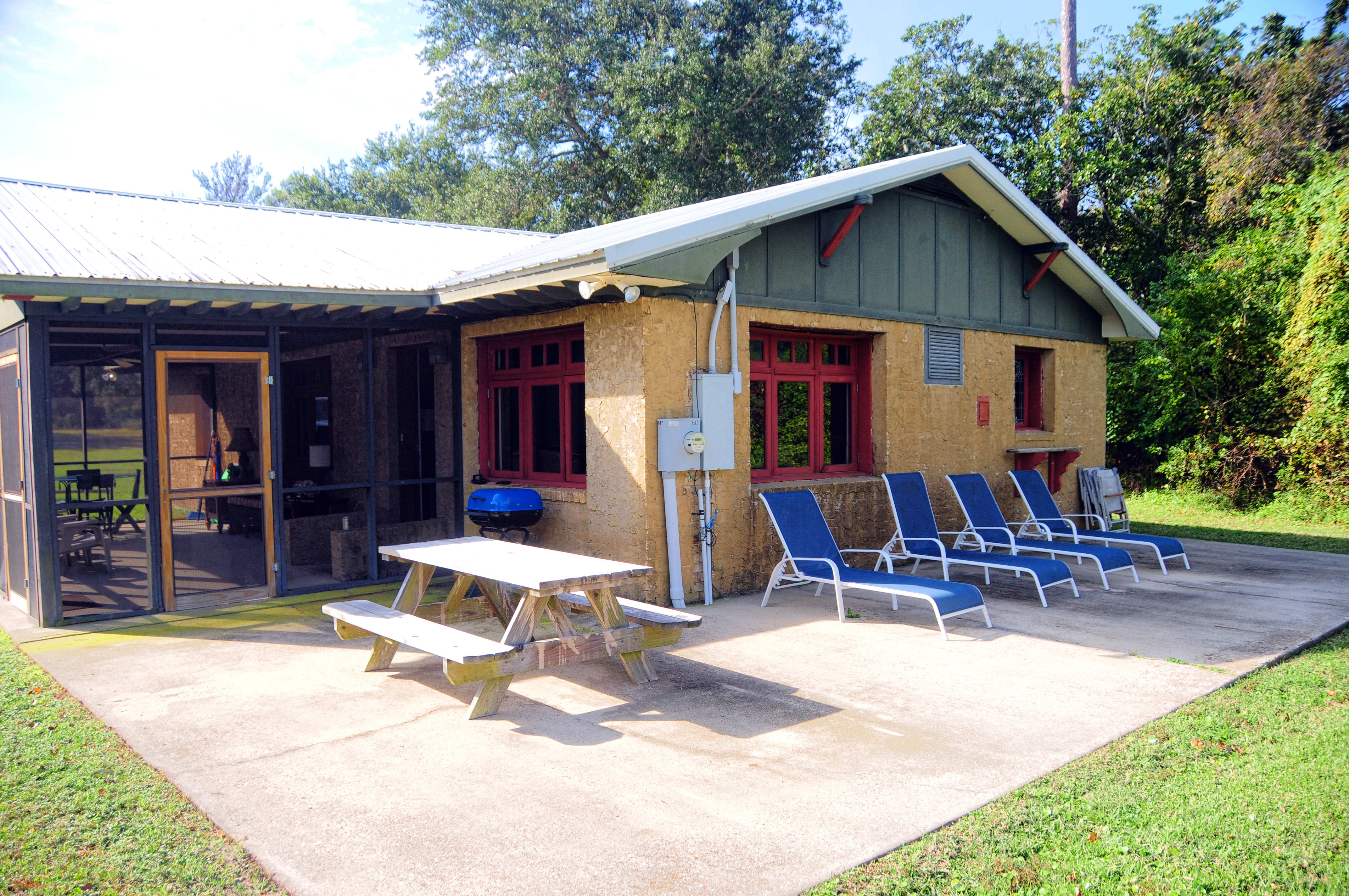 Picnic table and outdoor lounge chairs