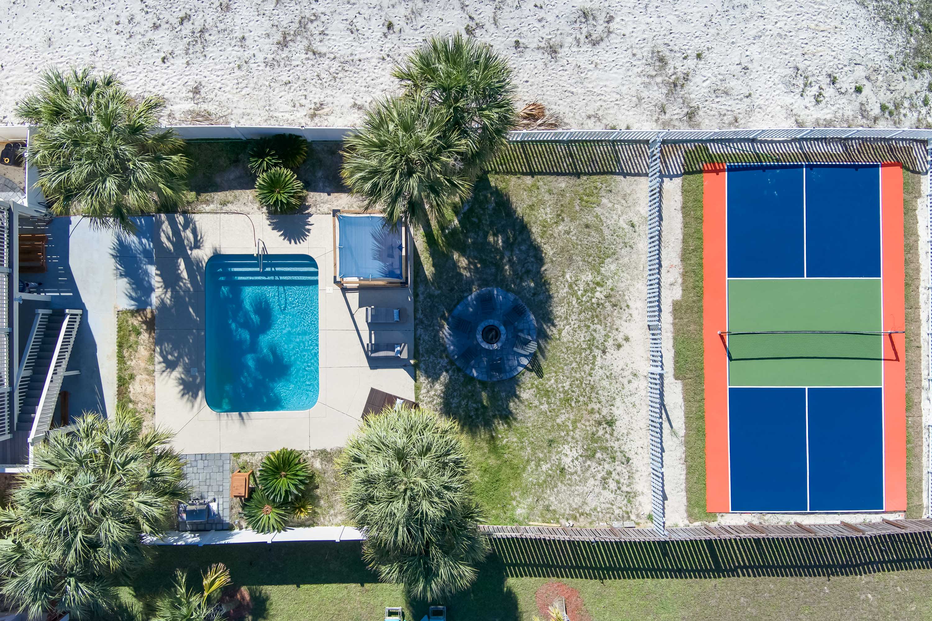 The only private pickleball court in Gulf Shores, private, heated pool, fire pit.