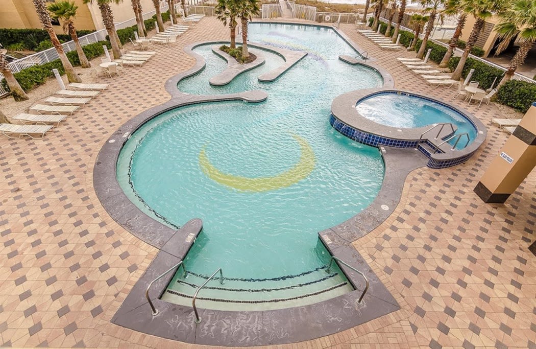 Giant pool on other side of skywalk with lazy river and hot tub!