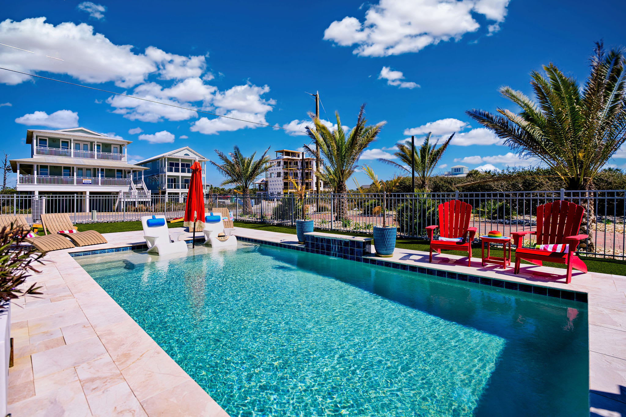 Large 15x25' pool with waterfall, sunshelf, sunshades and spectacular ocean view