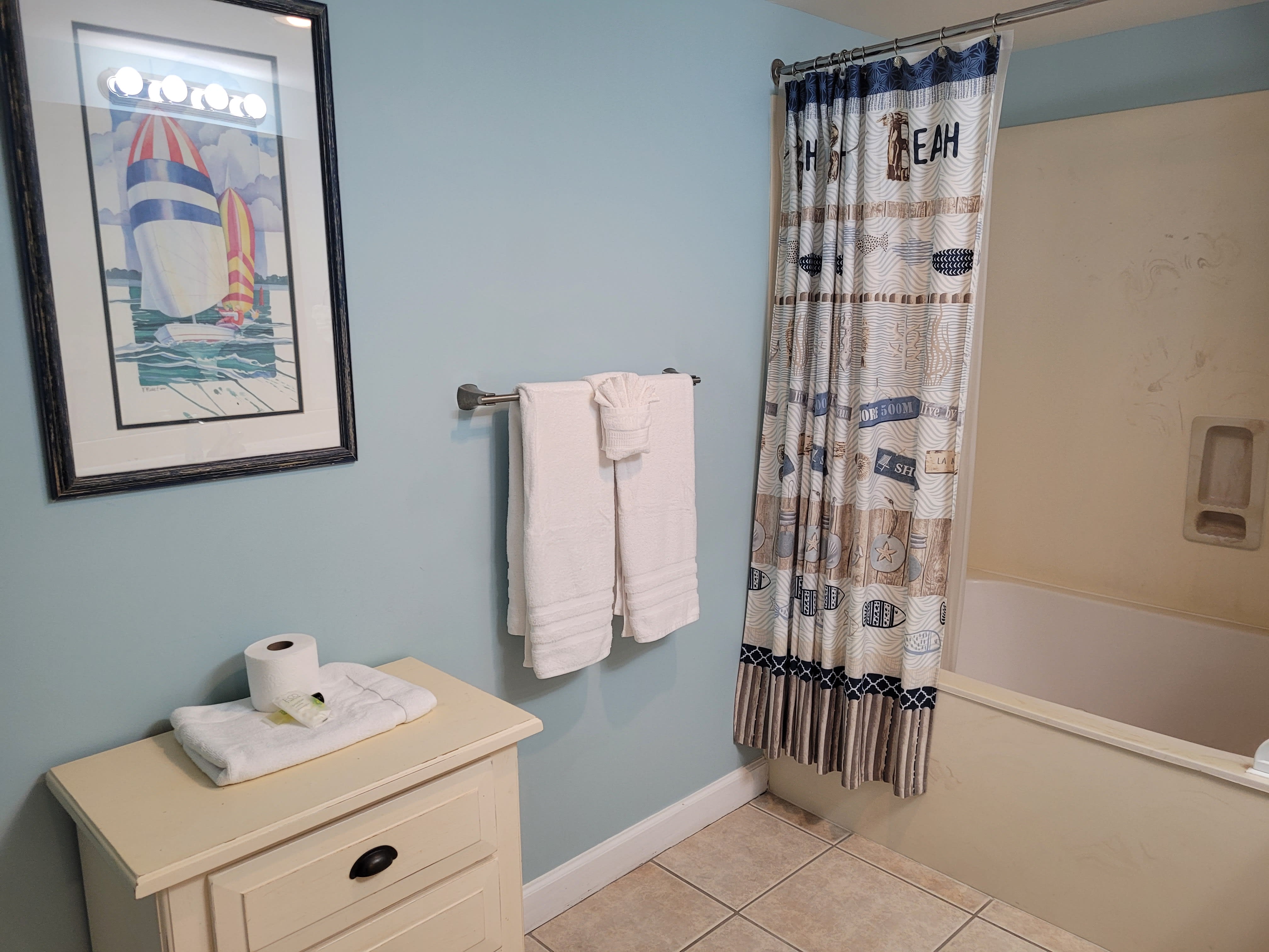 The large bathroom has a jetted tub