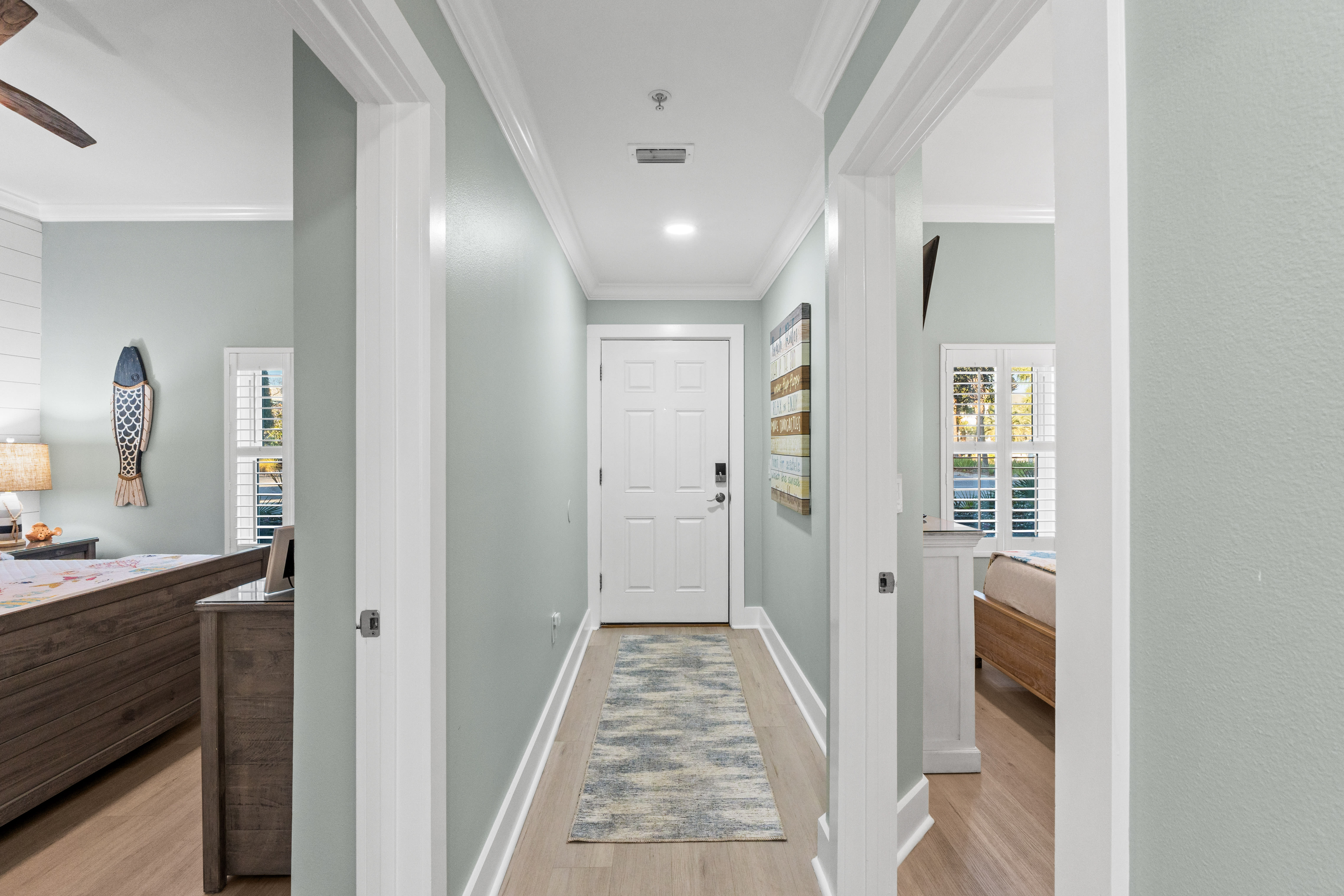 Bright coastal entryway with fresh modern finishes 