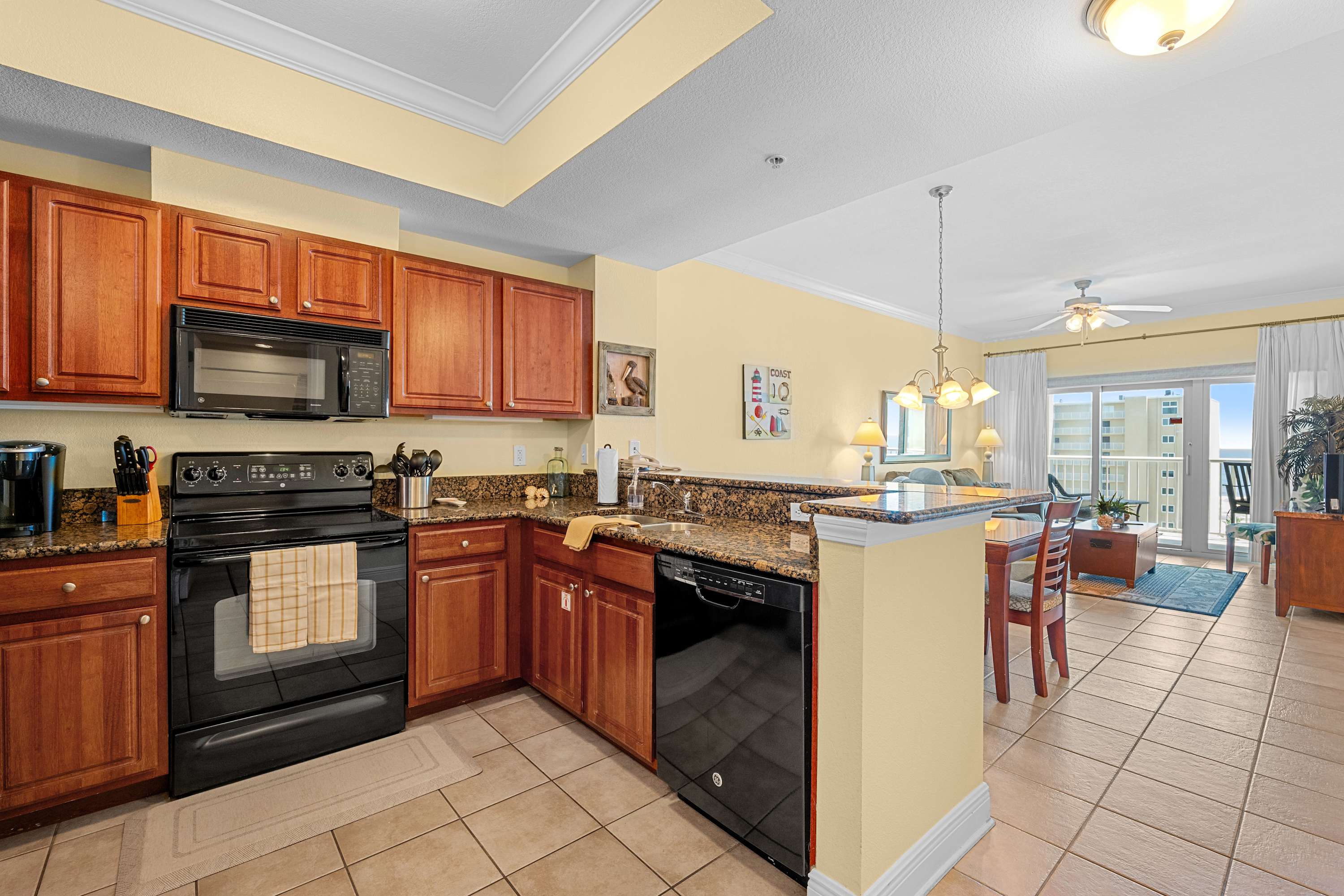 Kitchen with cooking utensils, coffee maker, toaster and all your cooking essentials.
