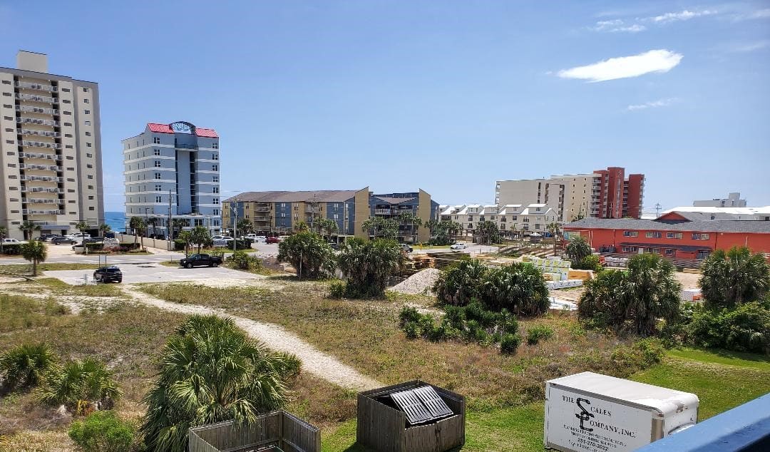 4 min walking path to public beach access, right of condo