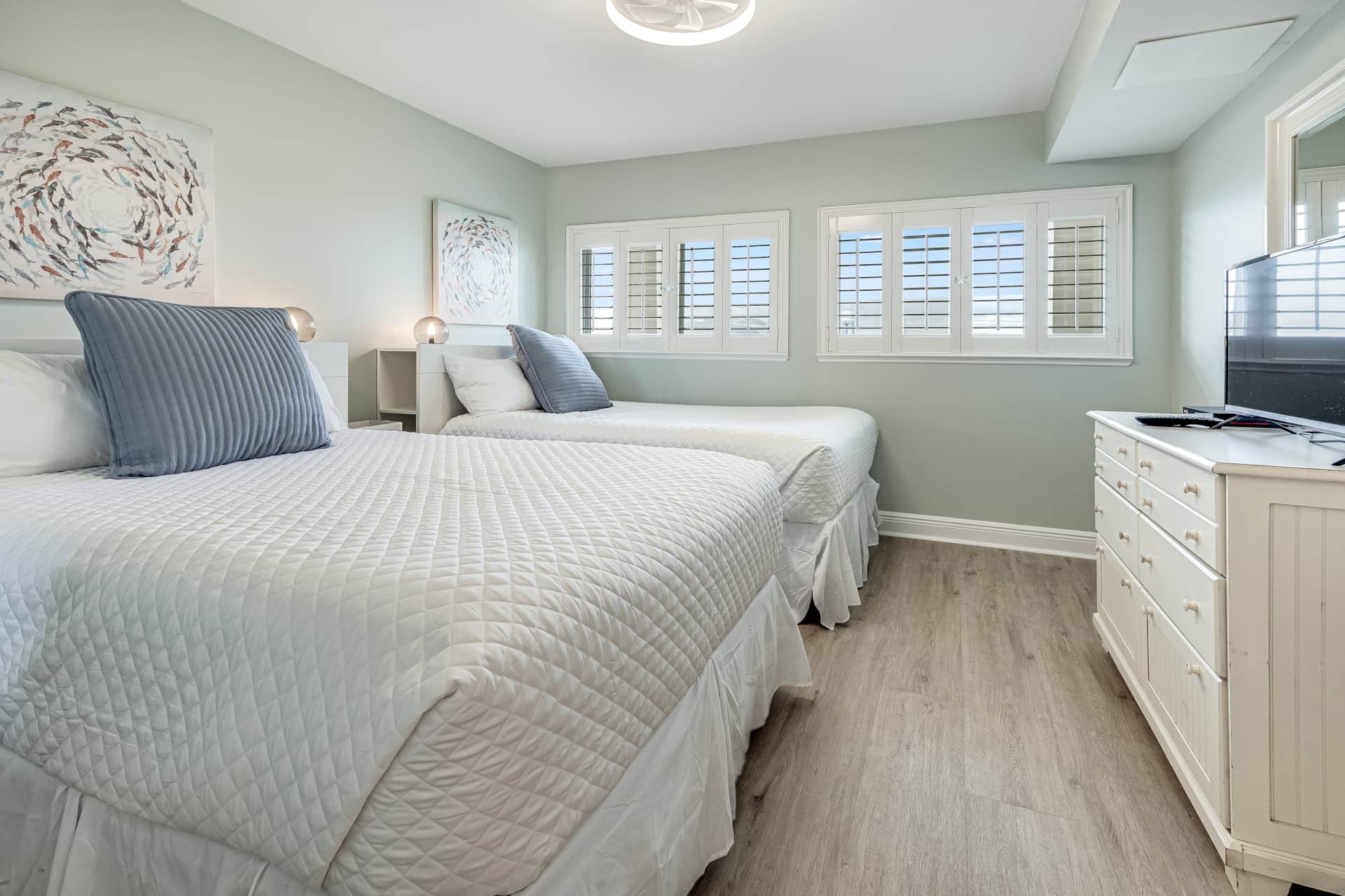 guest suite with two full beds